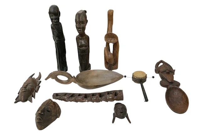 A quantity of assorted African carved wooden tribal figures and bowls