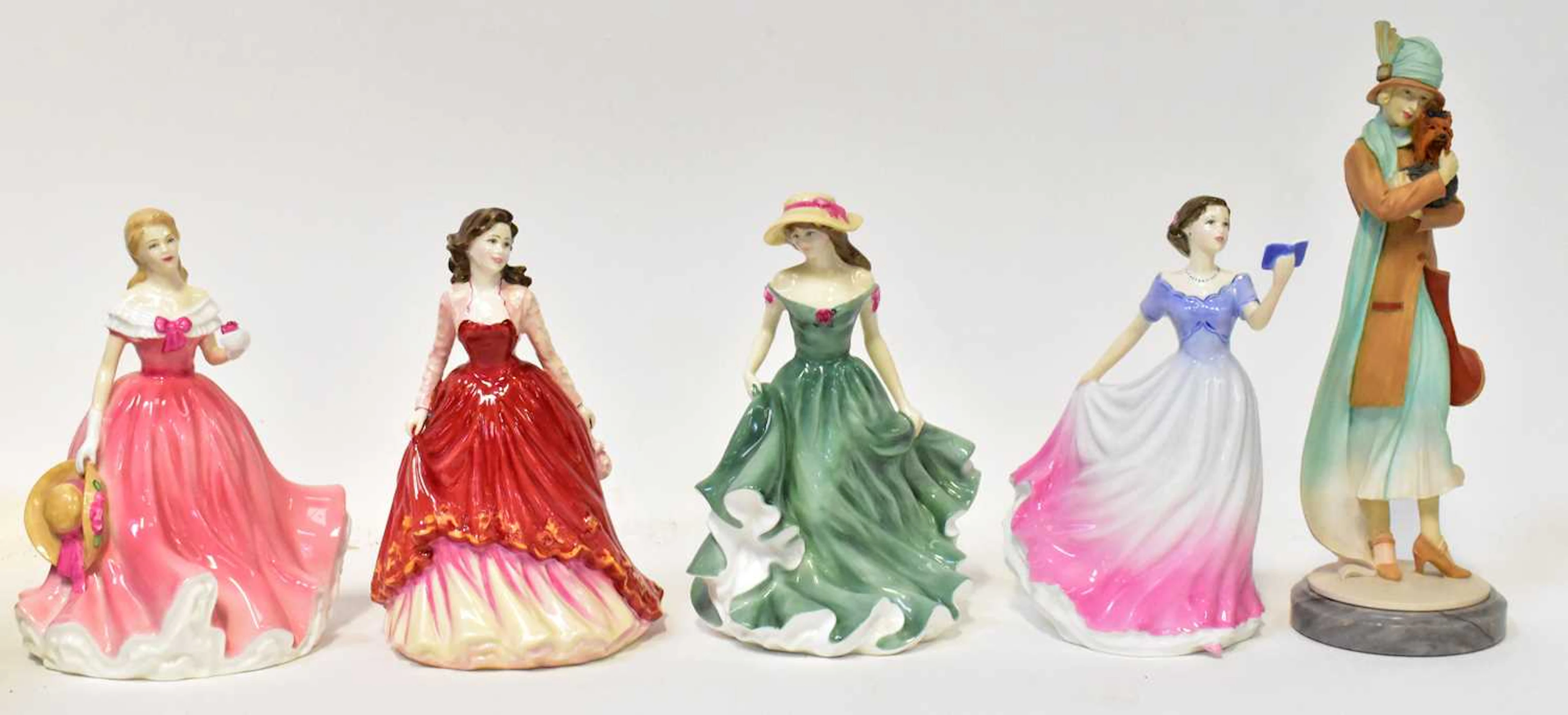 ROYAL DOULTON; eleven figures of ladies