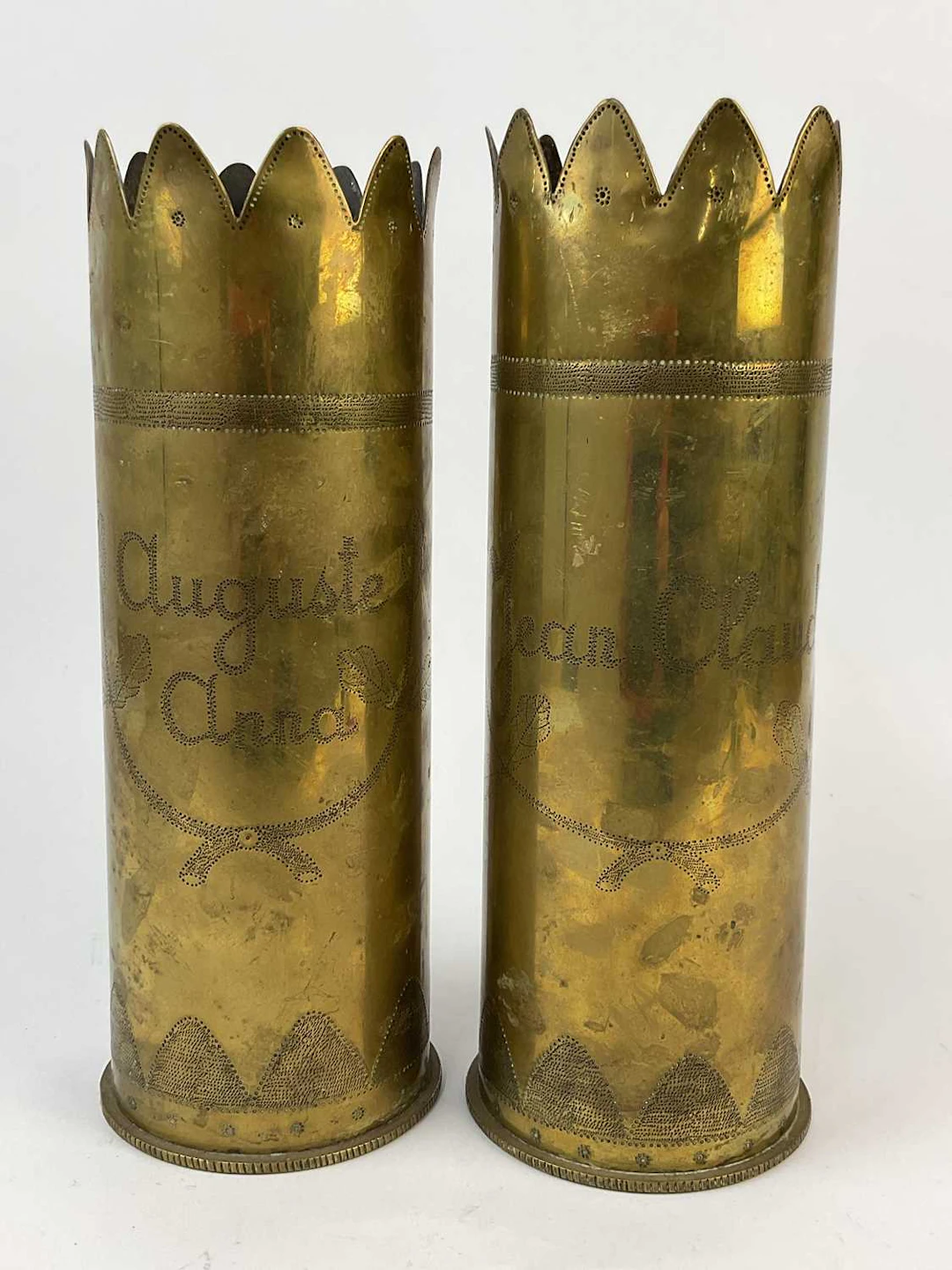 A pair of WWII brass trench art shell casings dated 1944