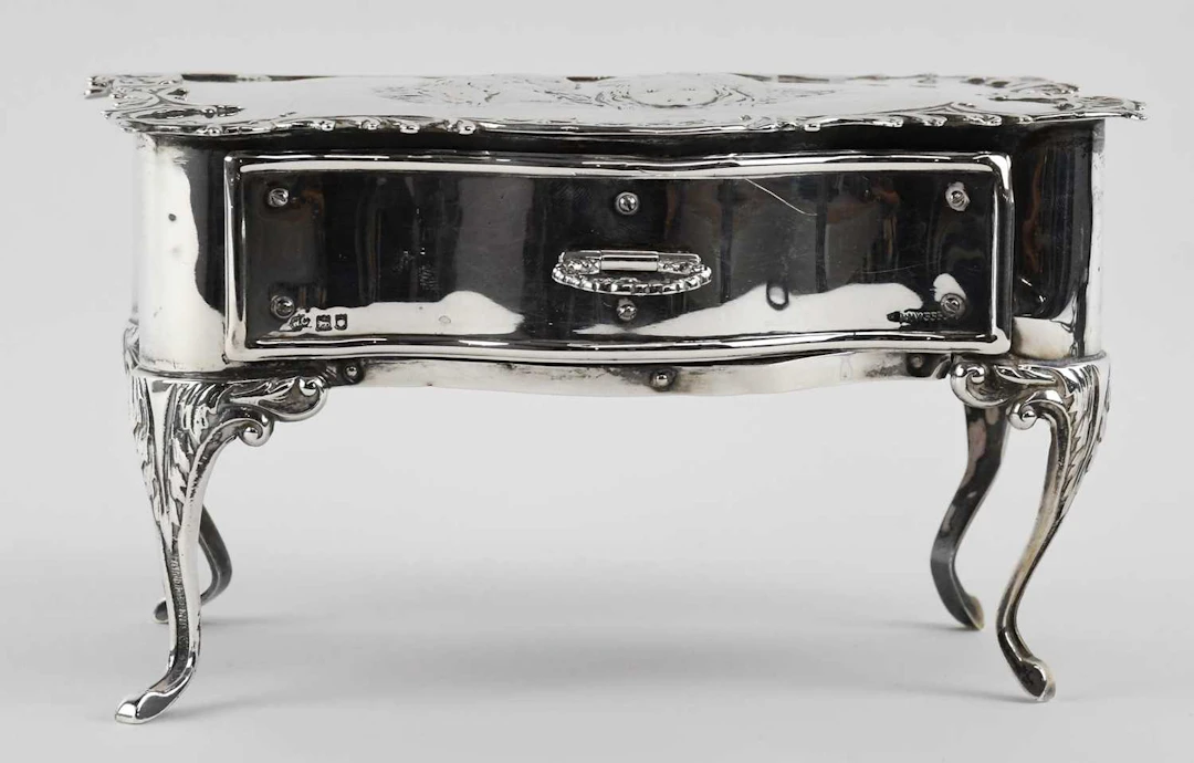 WILLIAM COMYNS & SONS; an Edward VII hallmarked silver...