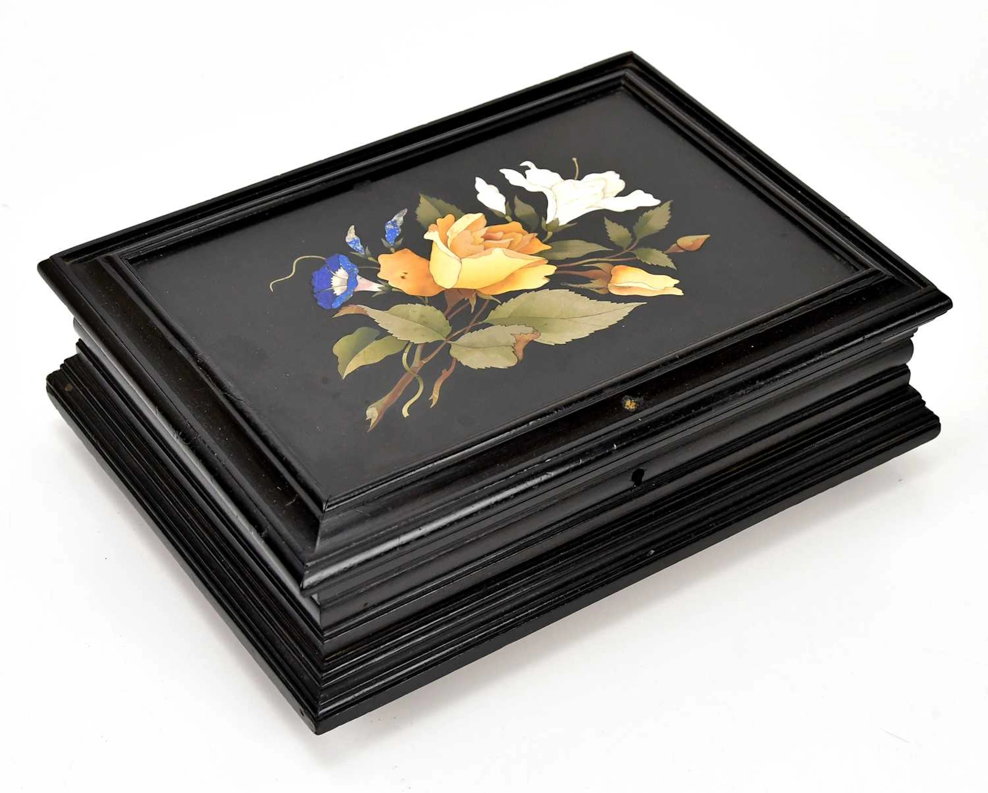 ASHFORD MARBLE; an ebonised box inset with an Ashford...