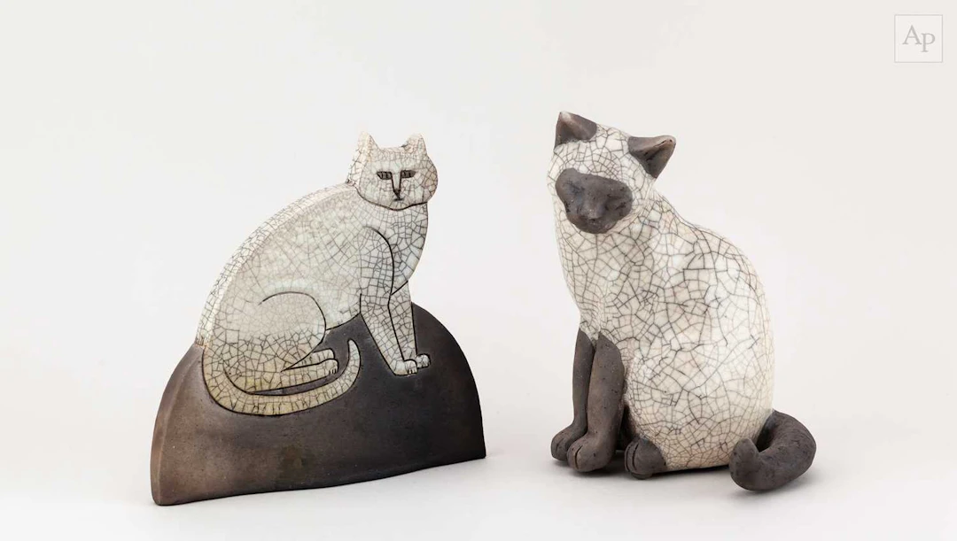 PAUL JENKINS; a raku sculpture of a cat