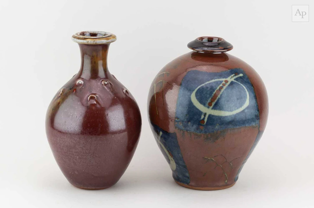 JOHN JELFS (born 1946); a stoneware bottle covered in...
