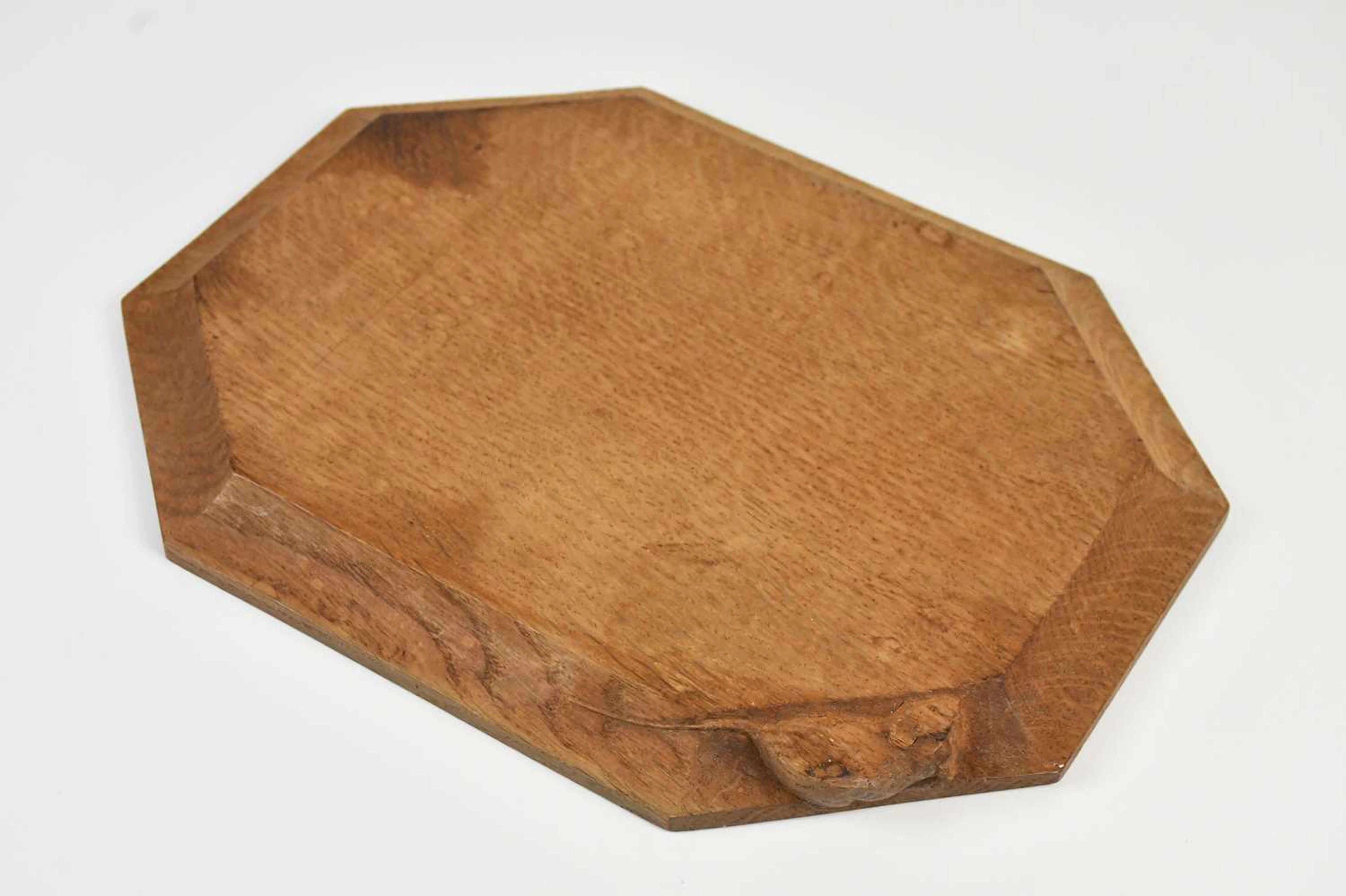 ROBERT ‘MOUSEMAN’ THOMPSON; a carved oak octagonal breadboard