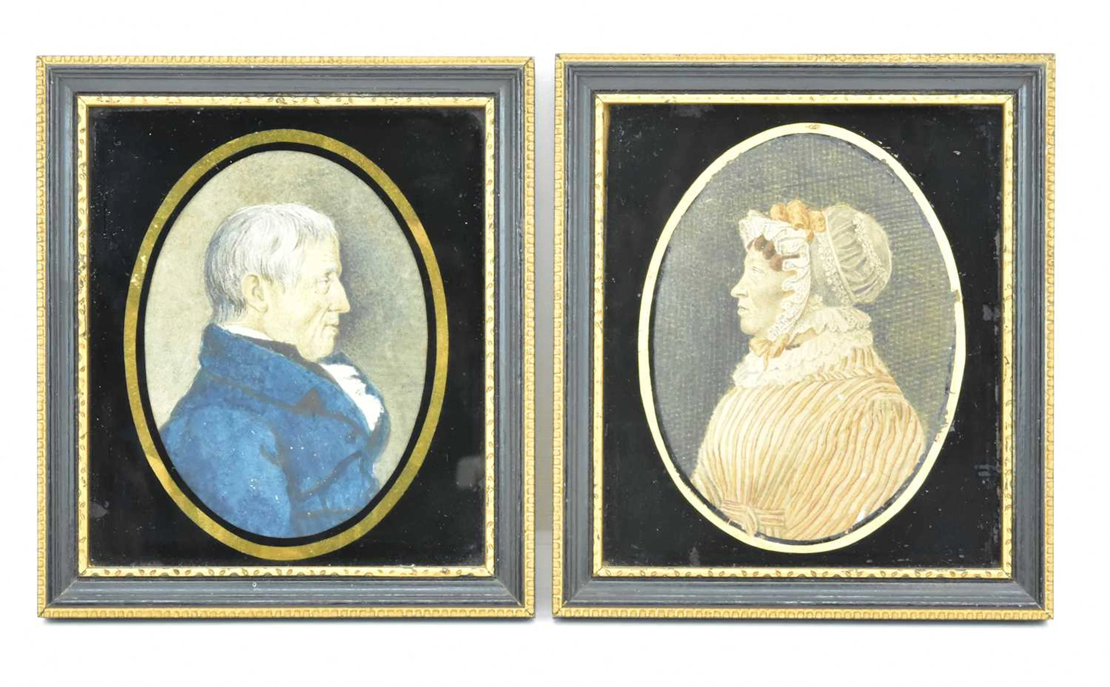 A pair of early 19th century miniature watercolour on paper portraits