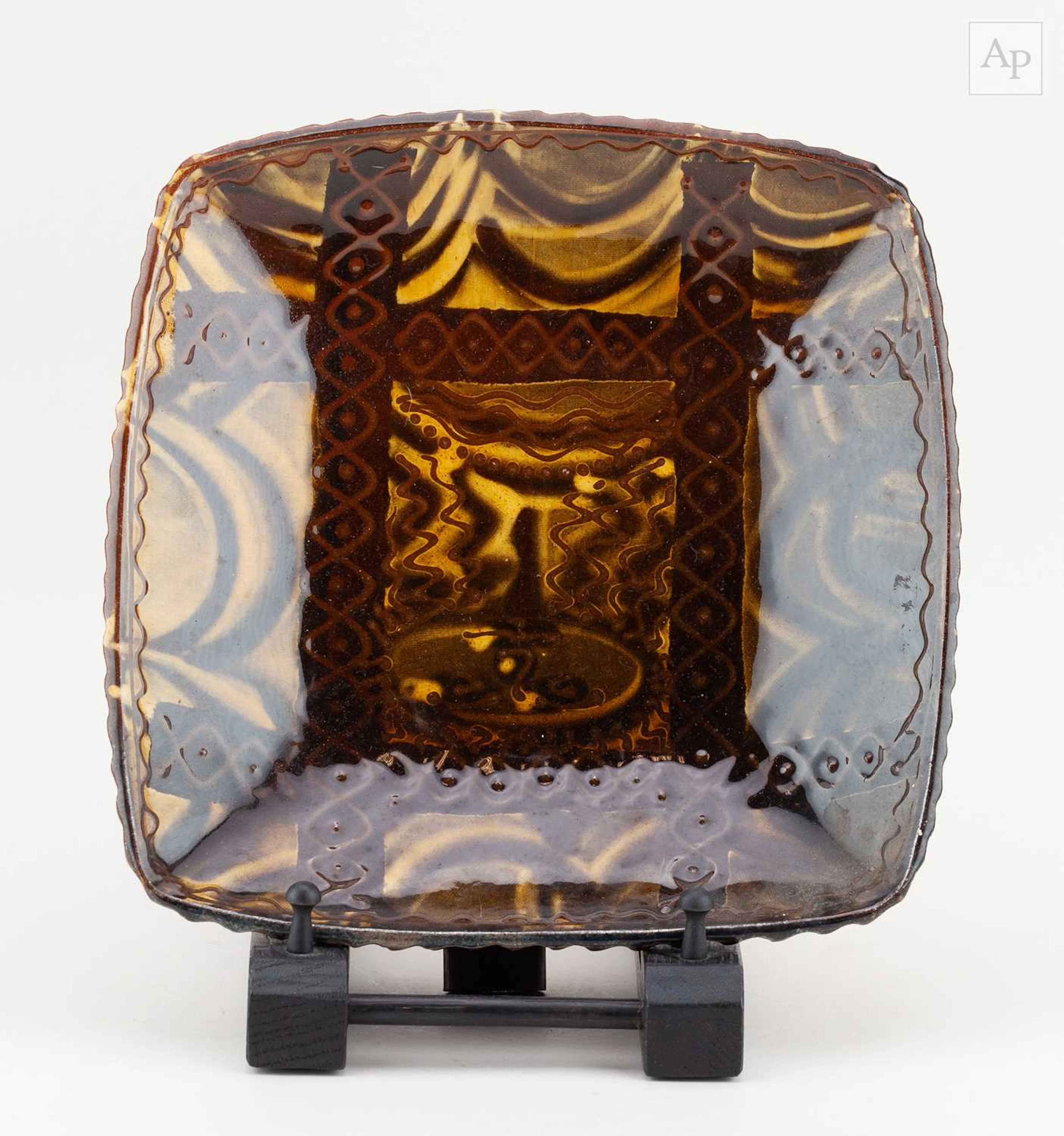 HANNAH McANDREW (born 1977); a square slipware dish with...