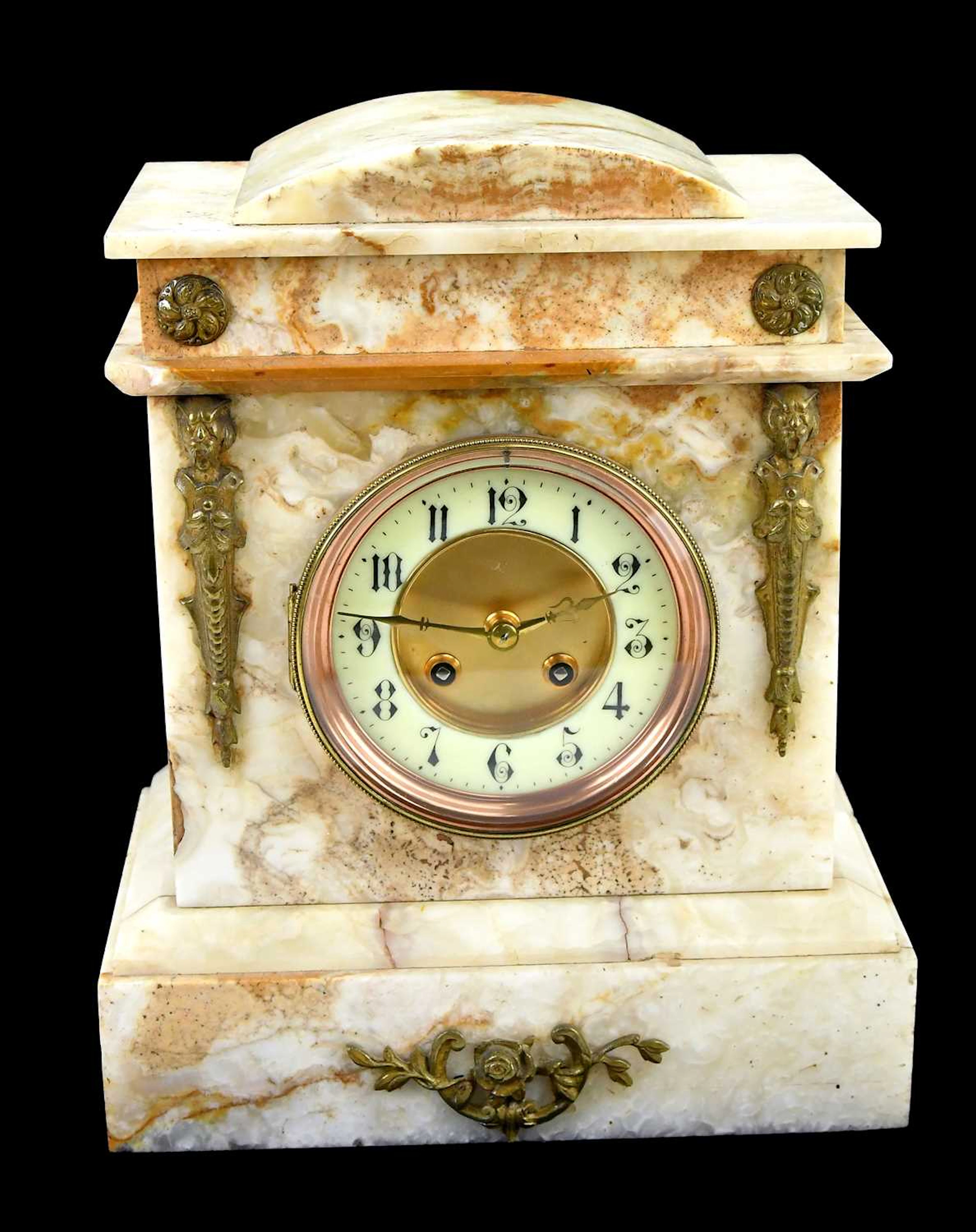 A white marble mantel clock
