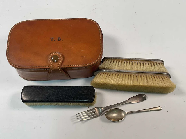 W J MYATT & CO; a George V hallmarked silver brush