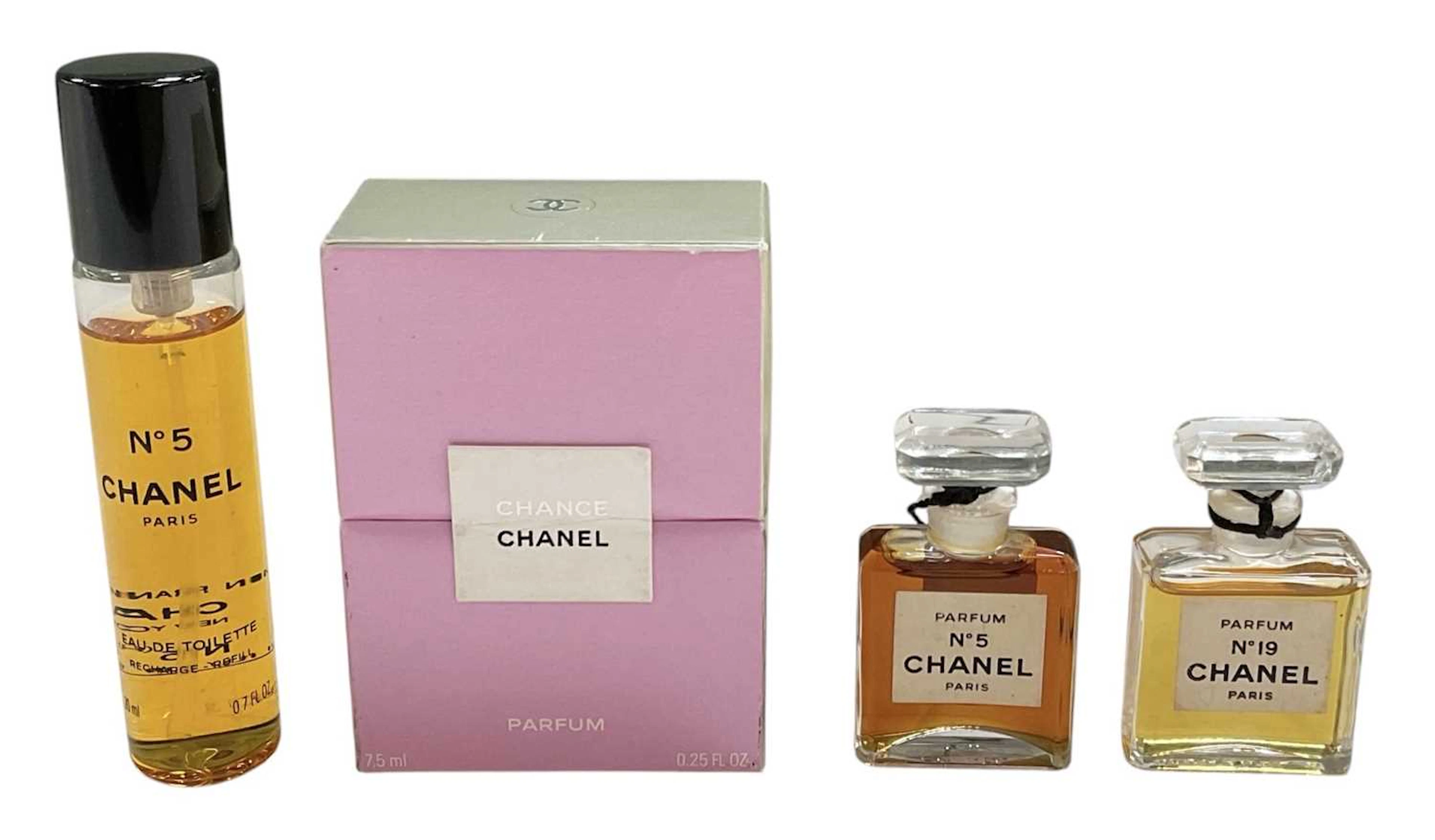 CHANEL; four miniature bottles of lady's vintage perfume