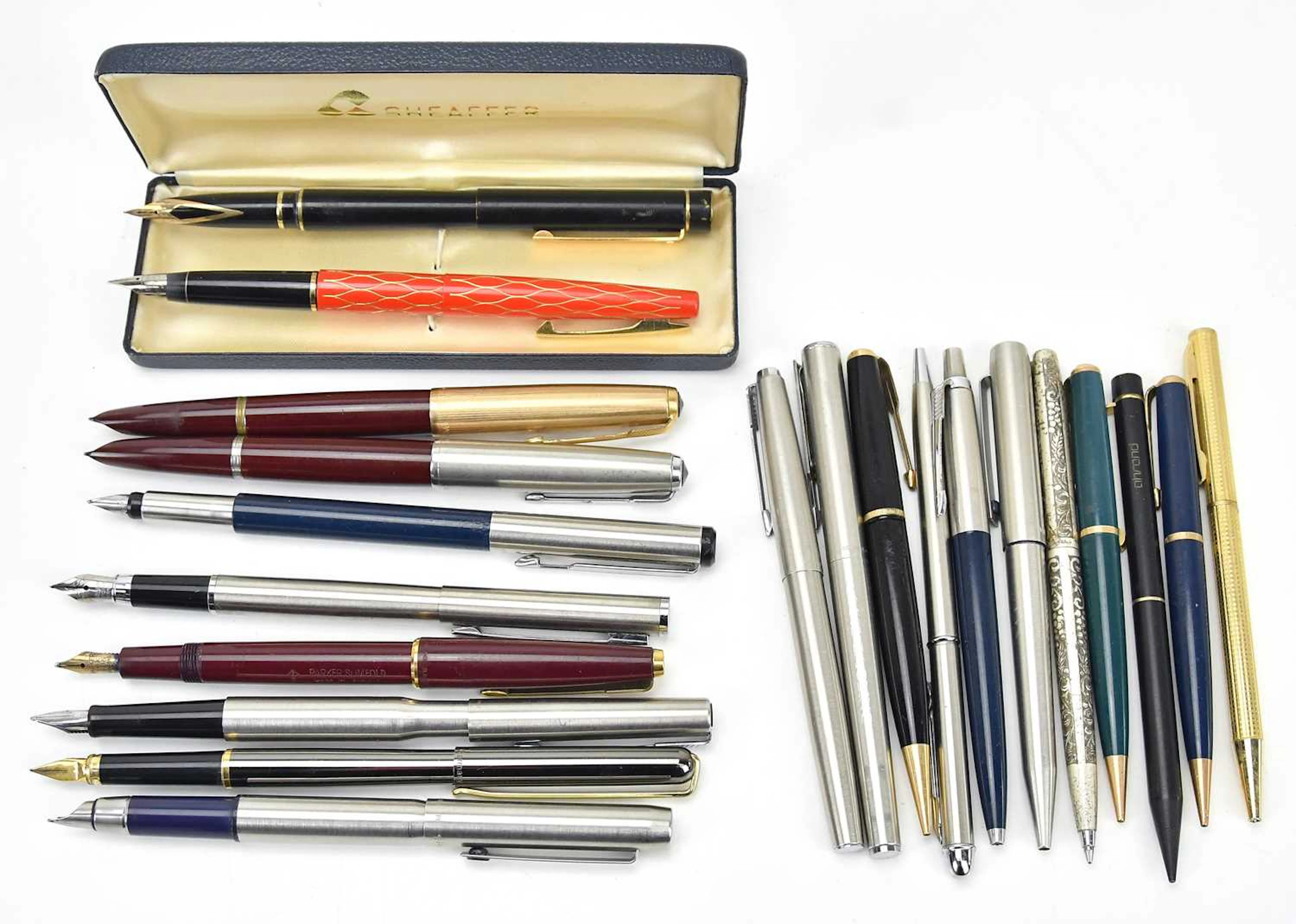 A large collection of fountain and ballpoint pens