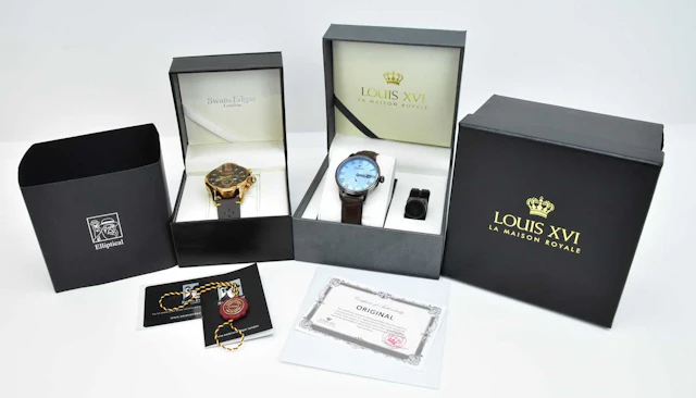 Two modern gentleman's dress watches comprising a Swan...