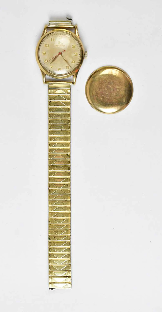 RECORD; a 1950s 9ct yellow gold watch head
