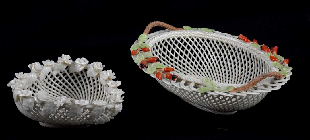 BELLEEK; two fine latticework bowls including a heart shaped example