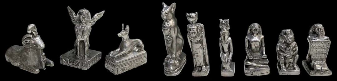 Nine assorted Egyptian Revival pewter figures