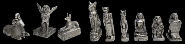 Nine assorted Egyptian Revival pewter figures