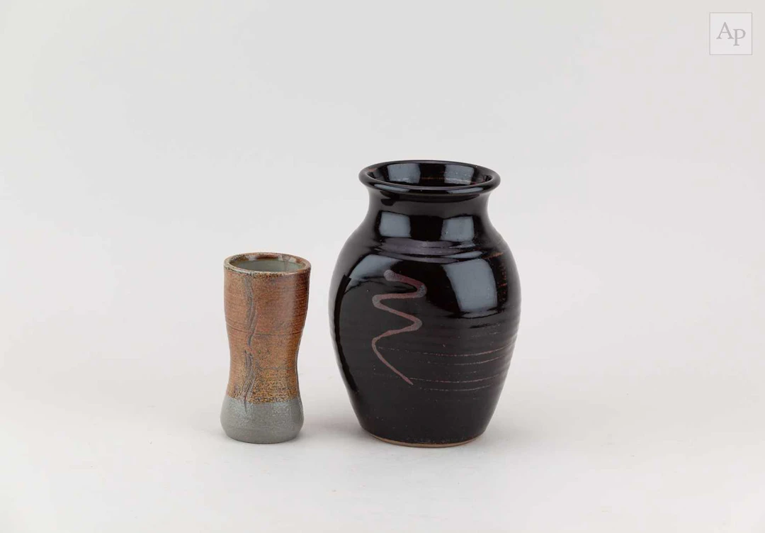 RAY FINCH (1914-2012) for Winchcombe Pottery; a small salt glazed vase
