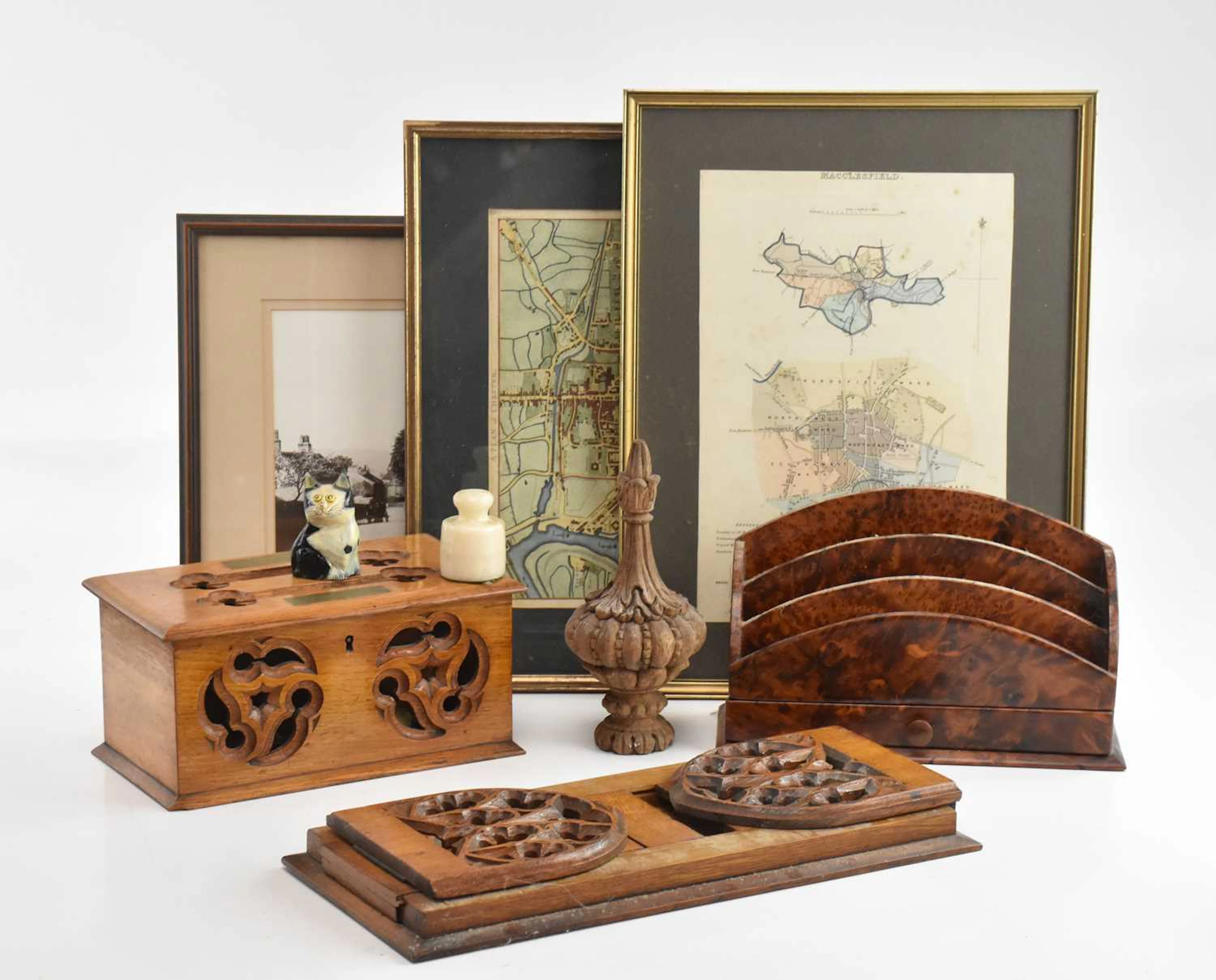 A Victorian carved oak box with brass plaque