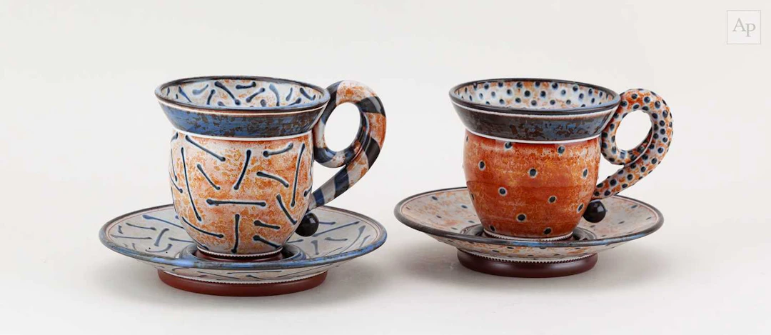 MORGEN HALL (1960-2016); a near pair of tin-glazed...