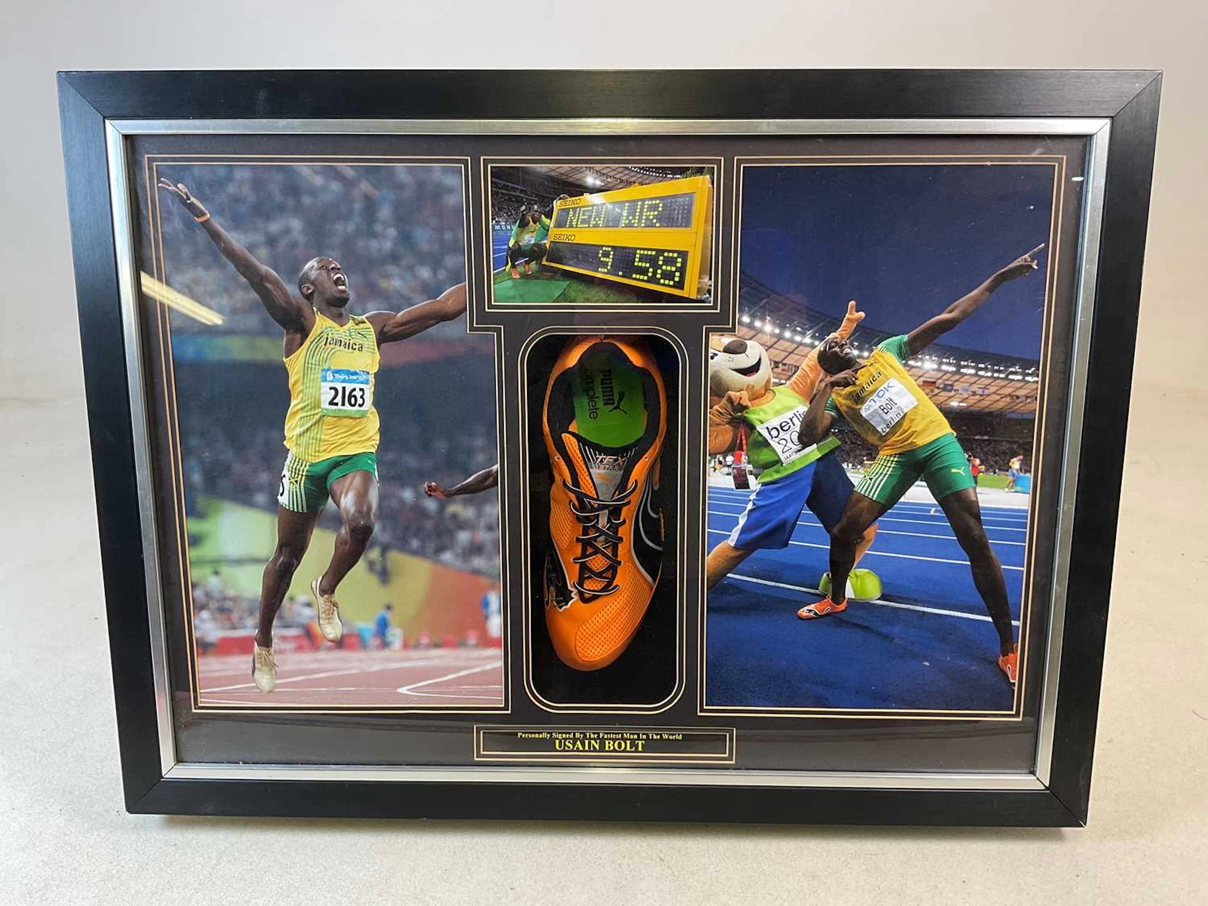 USAIN BOLT; a signed Puma running shoe
