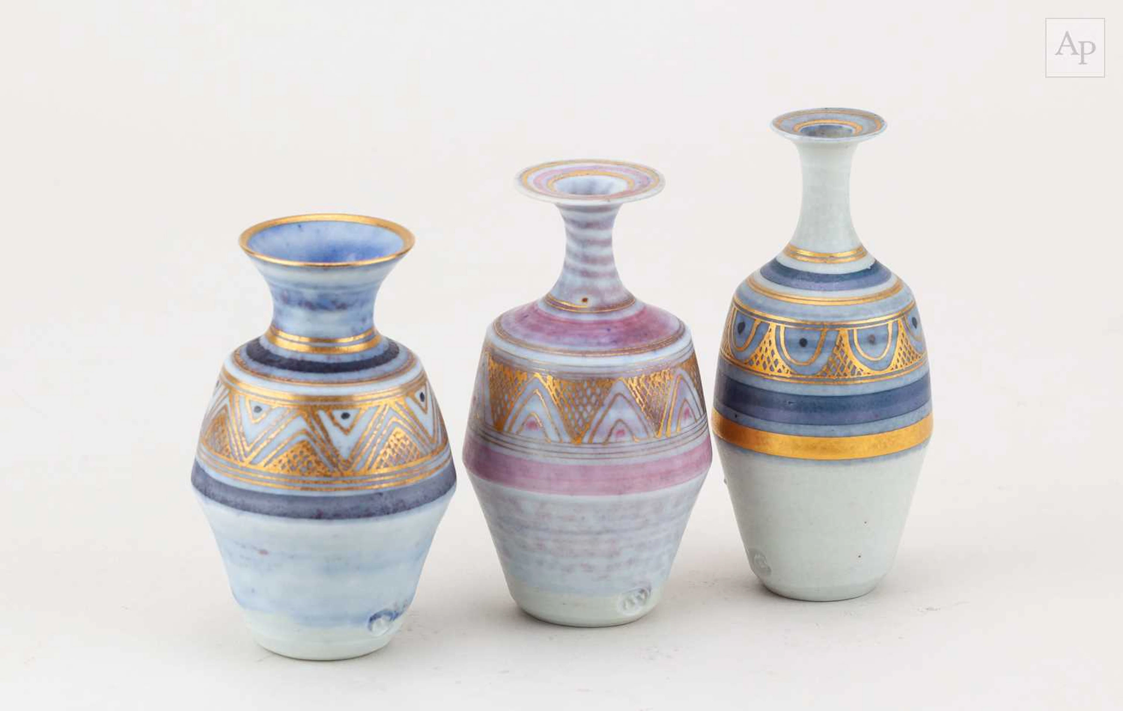 MARY RICH (1940-2022); a trio of small porcelain bottles...