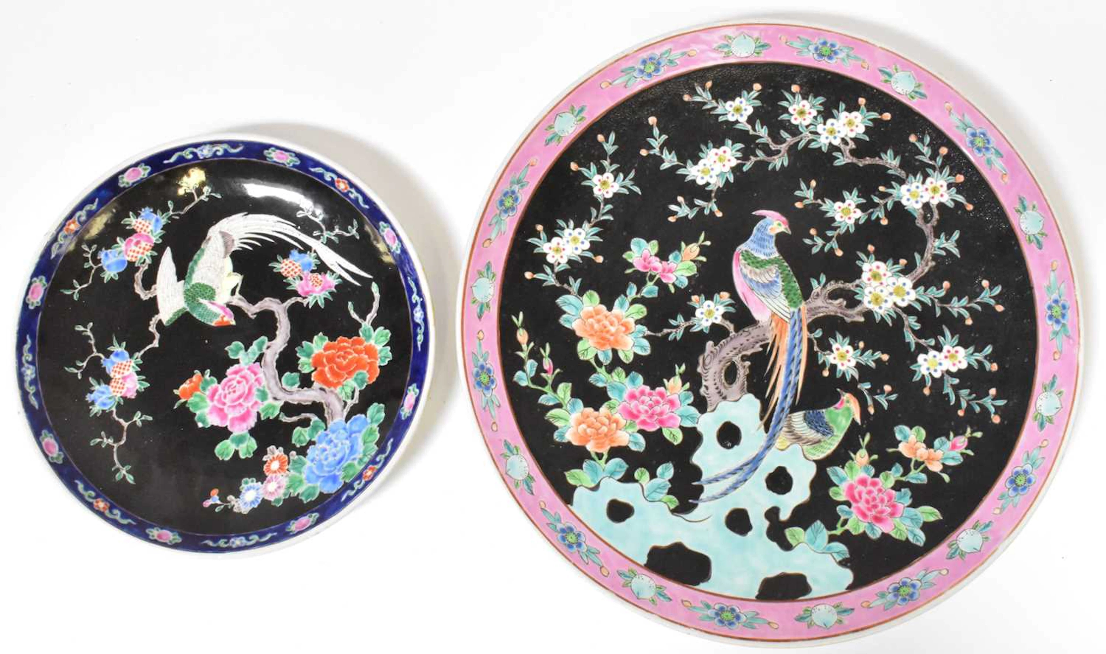 A Chinese Famille Noire charger decorated with Asiatic...