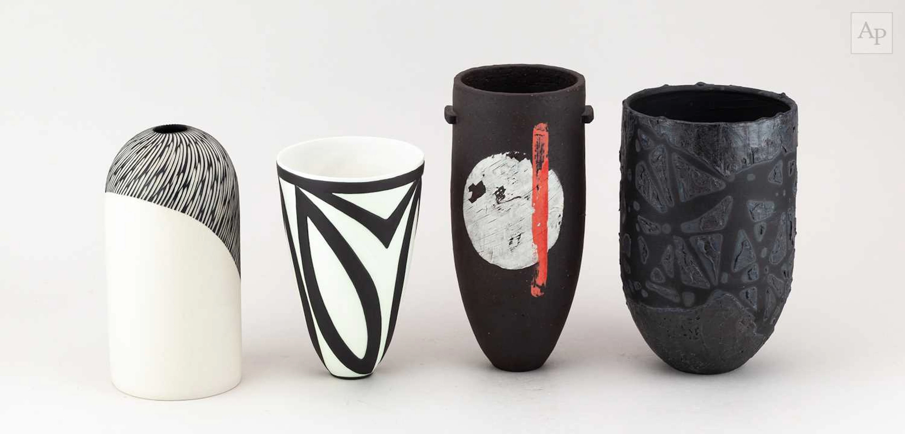 SUZI HUMPHRIES; a stoneware vessel with textured surface covered in black glaze