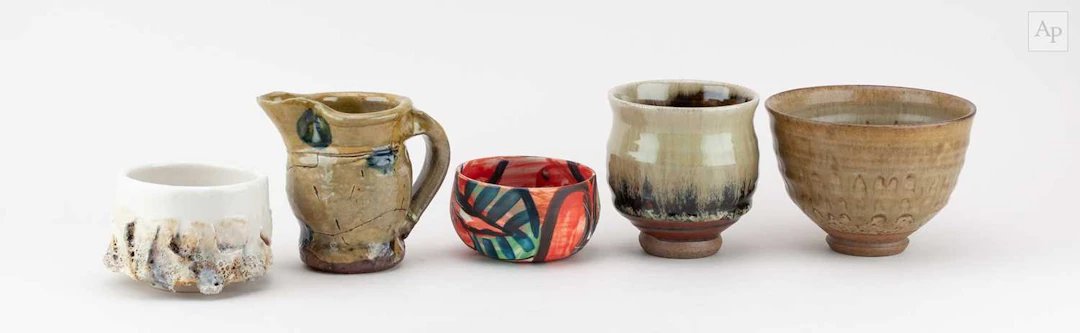 A group of studio ceramics by different makers comprising...
