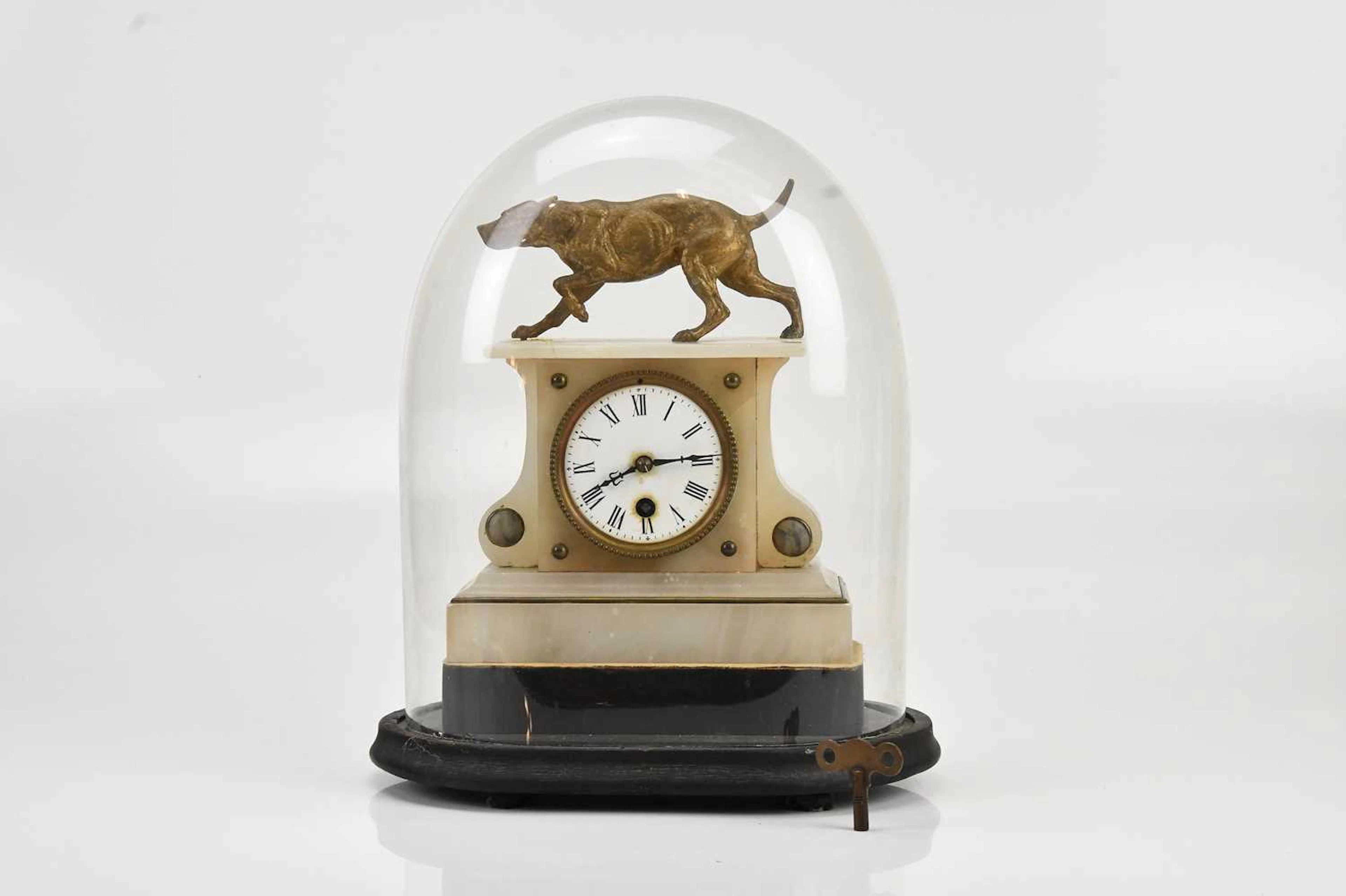 A Victorian alabaster eight day mantel clock