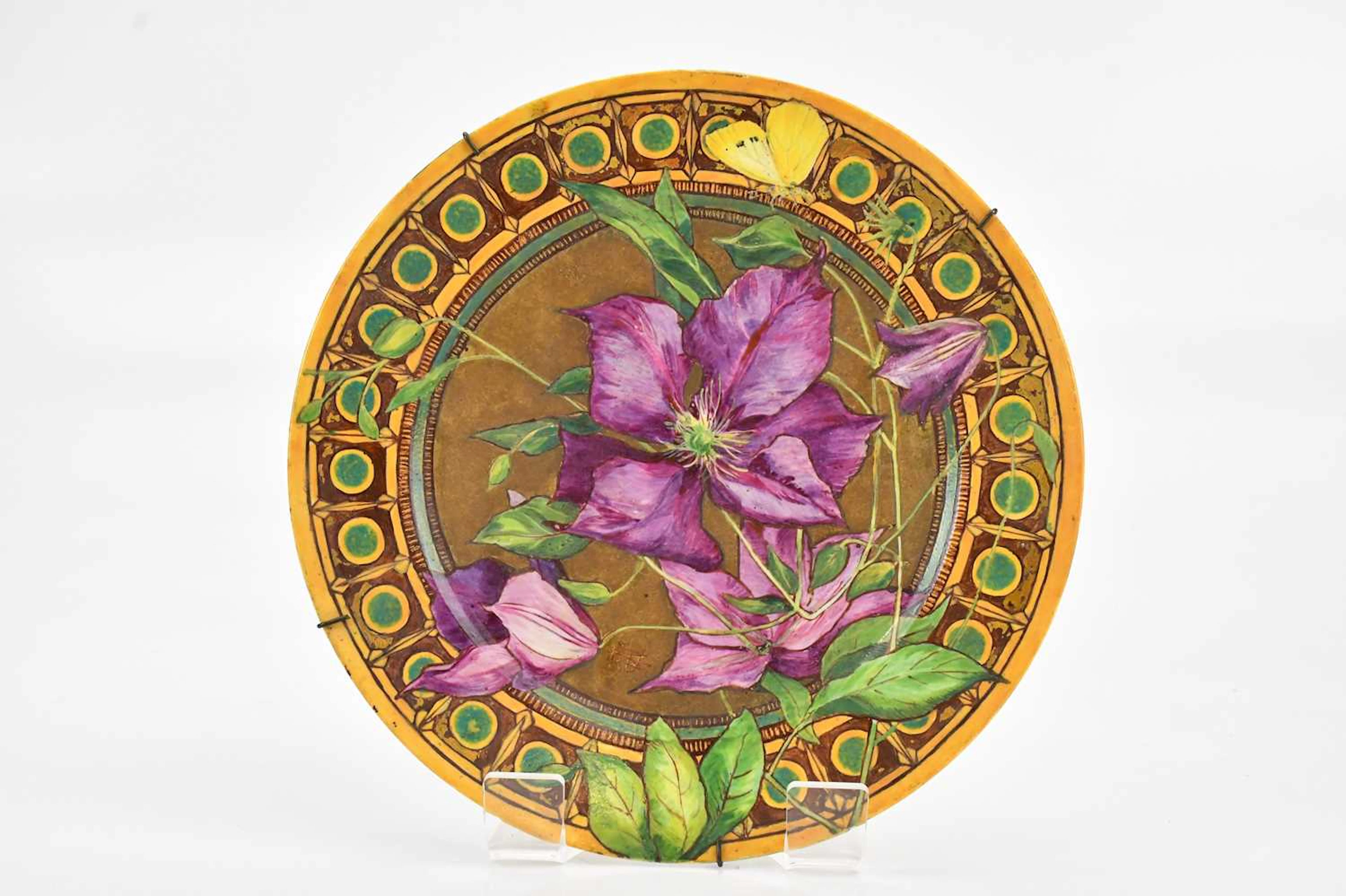 A late 19th century hand painted cabinet plate