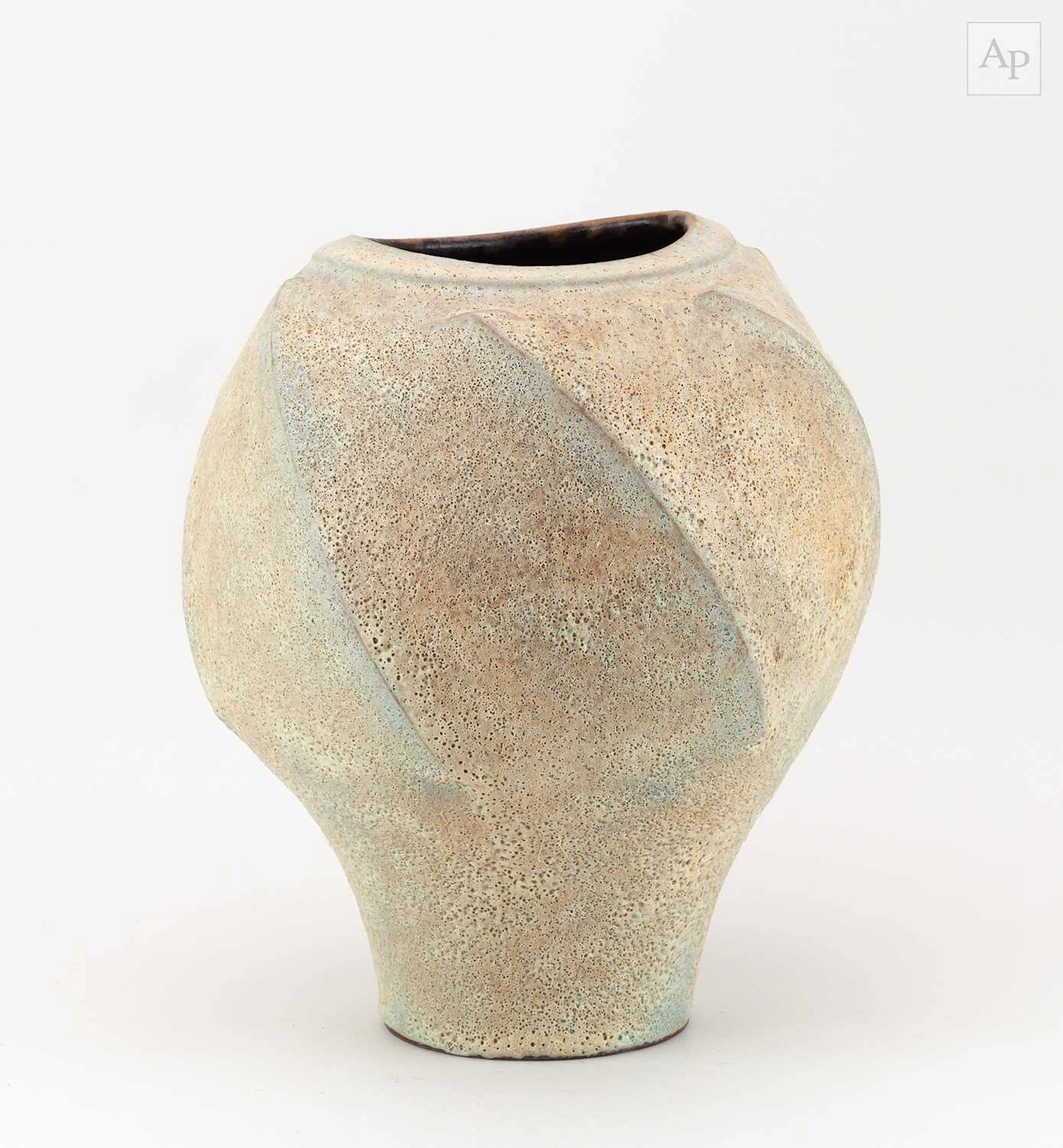 CHRIS CARTER (born 1945); a faceted stoneware twisted...