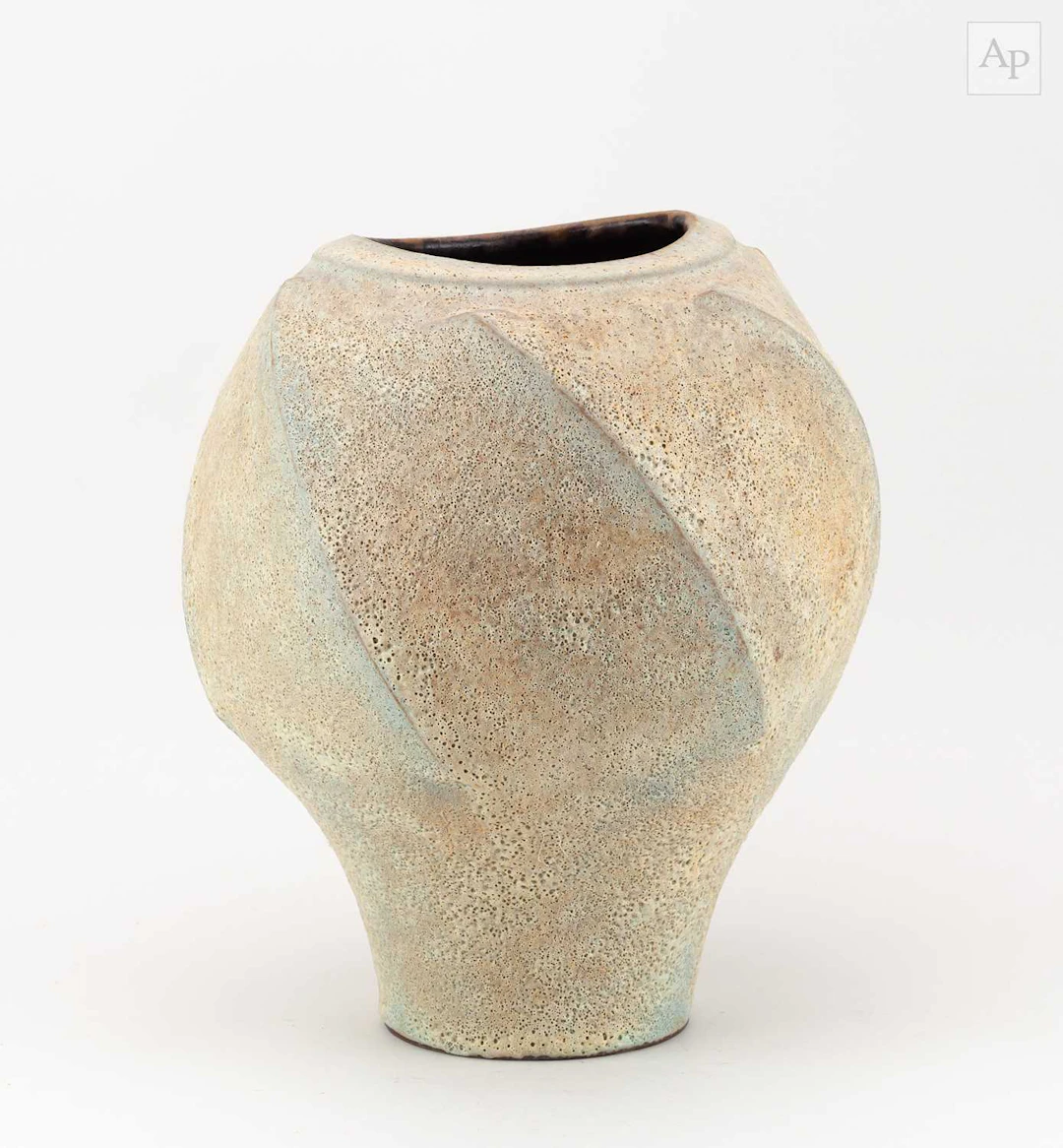 CHRIS CARTER (born 1945); a faceted stoneware twisted...