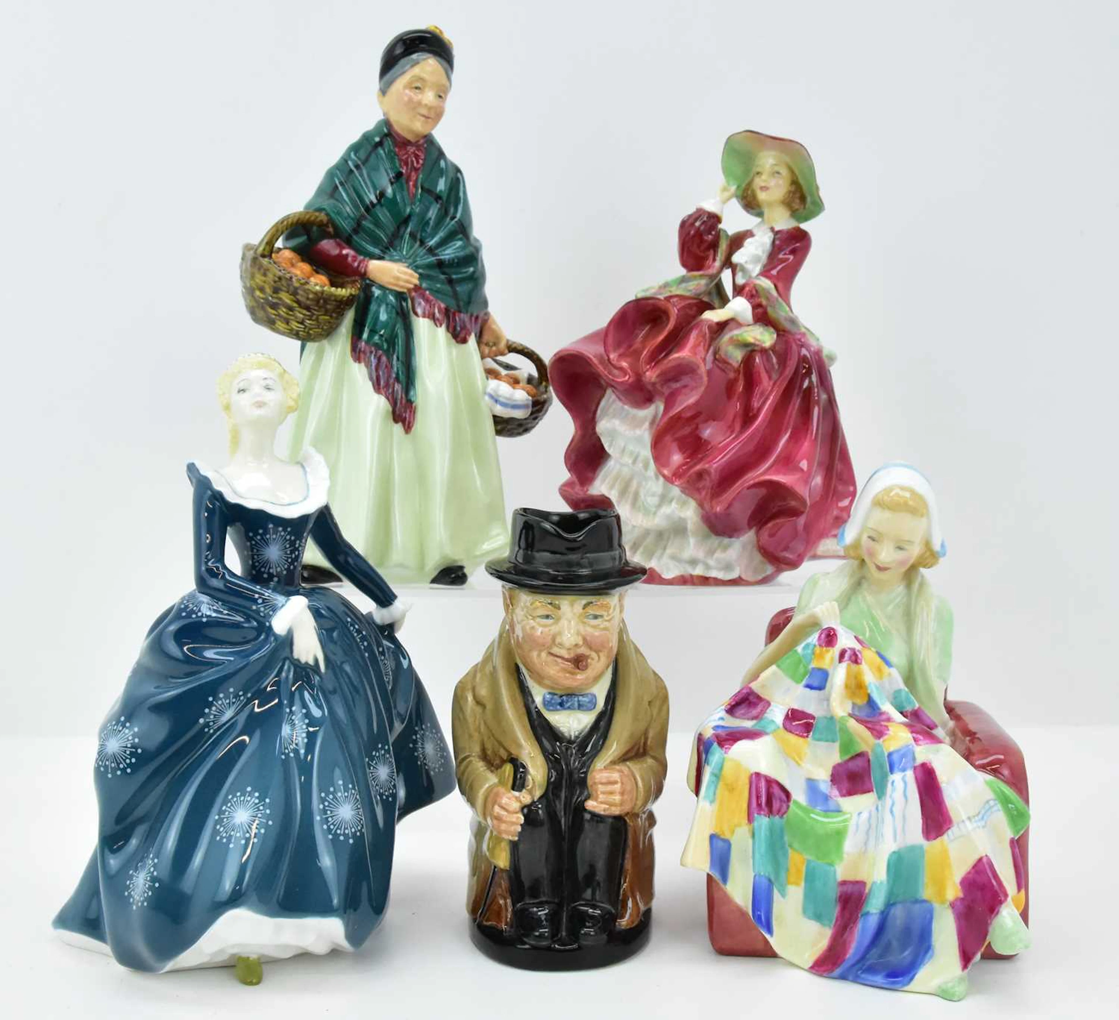 ROYAL DOULTON; four figures comprising 'The Patchwork Quilt'