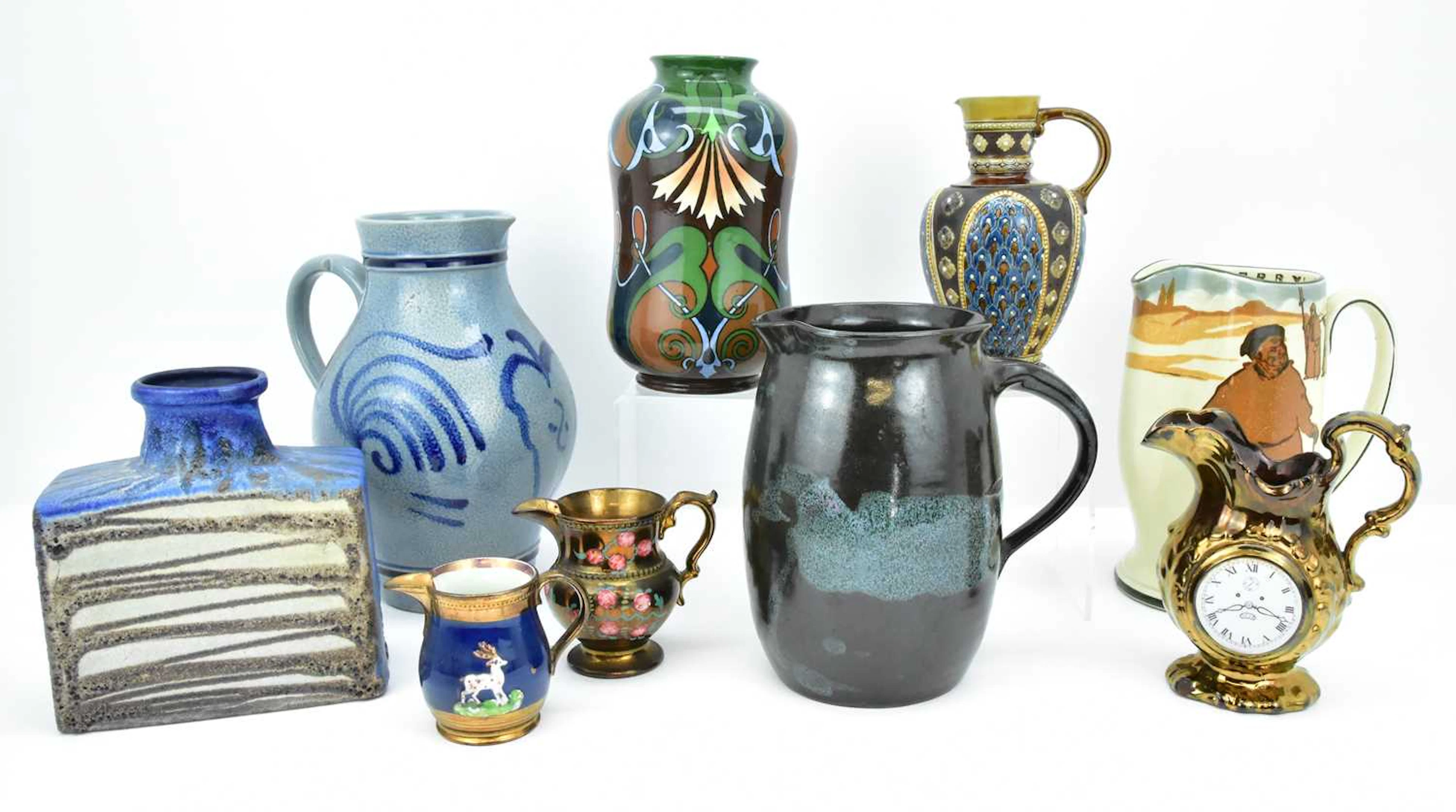 Various examples of decorative pottery comprising a...