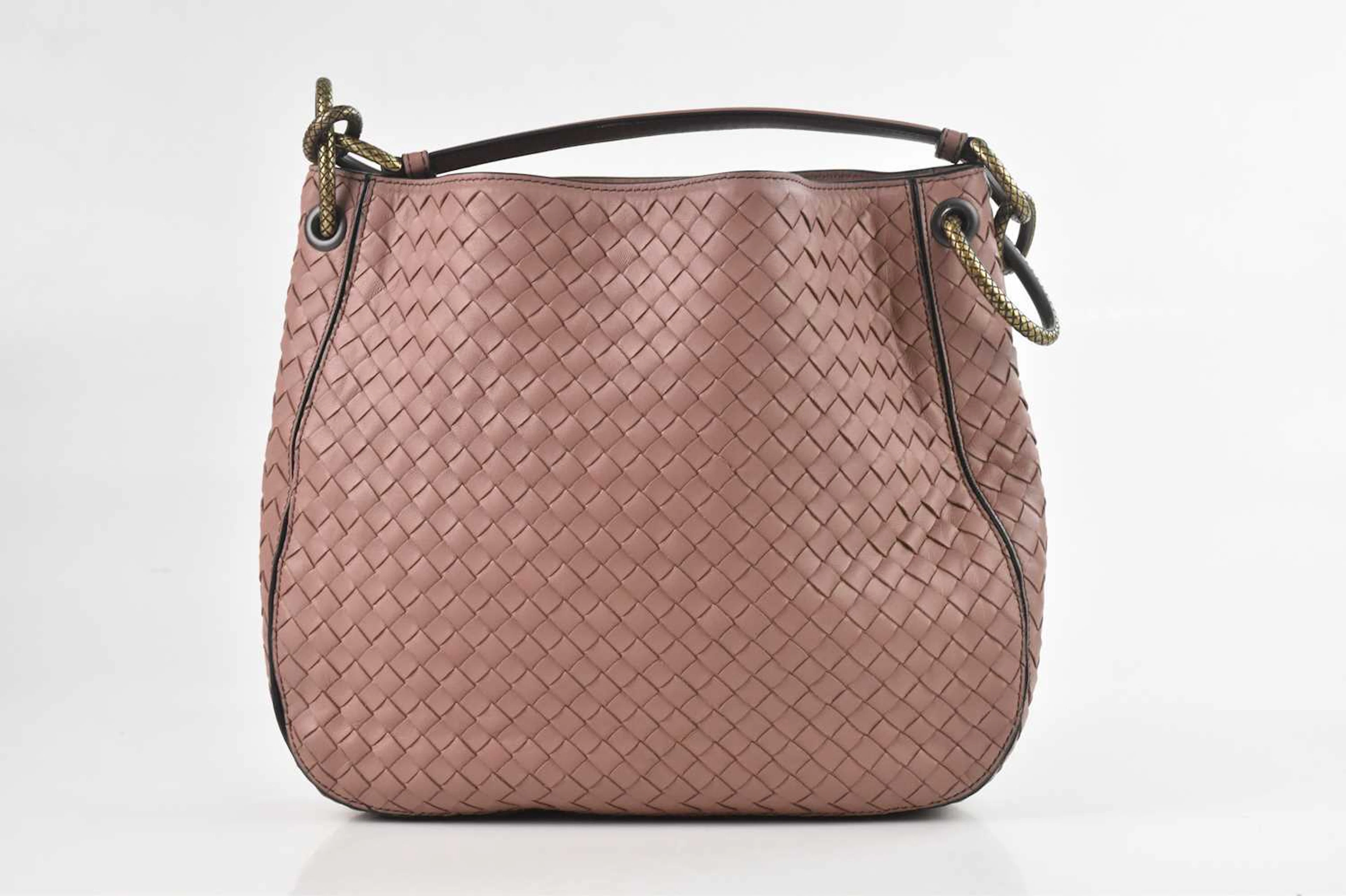 BOTTEGA VENETA; a pink nappa leather Intrecciato weave Garda shoulder bag