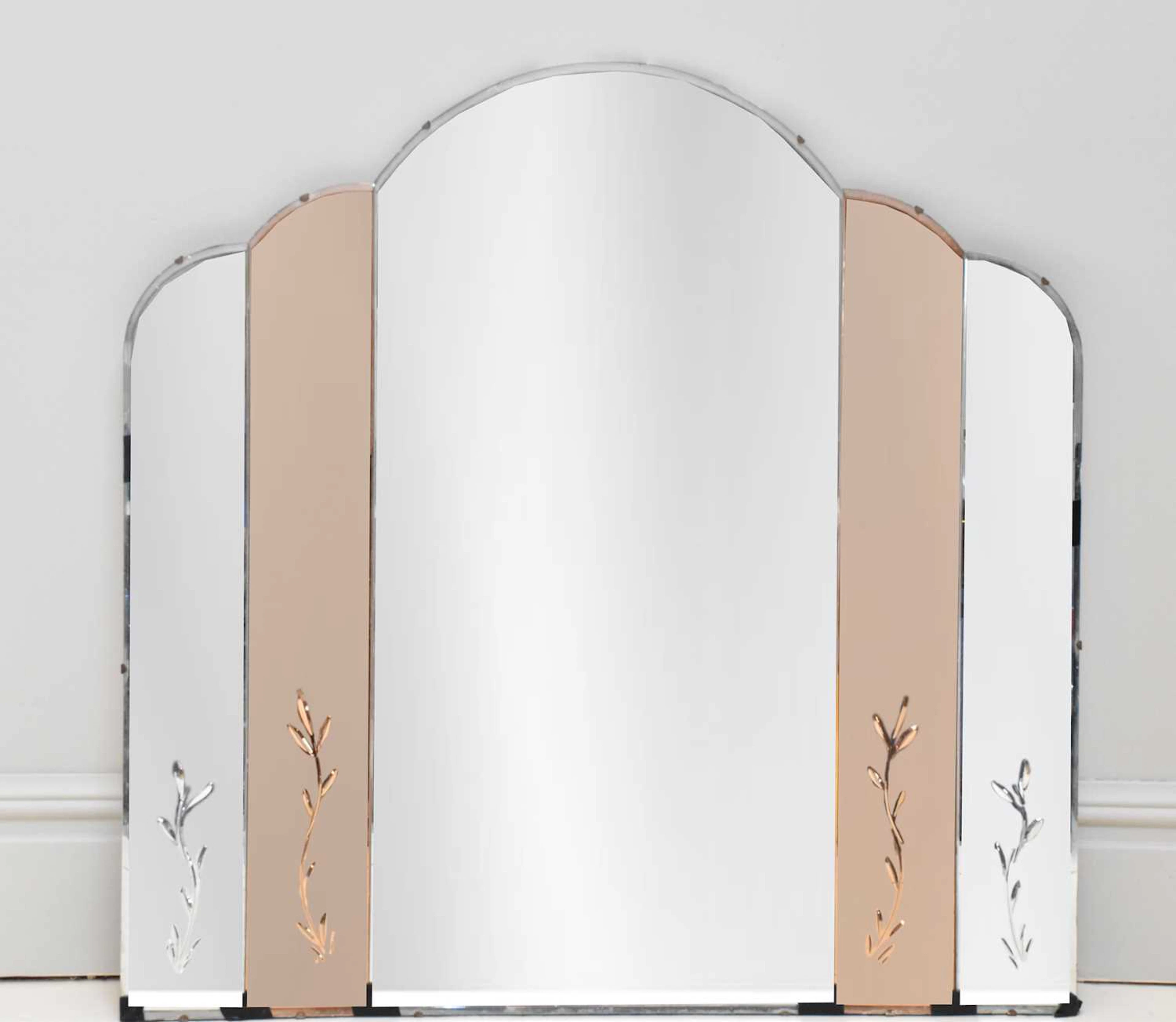 A large Art Deco peach and clear glass wall mirror