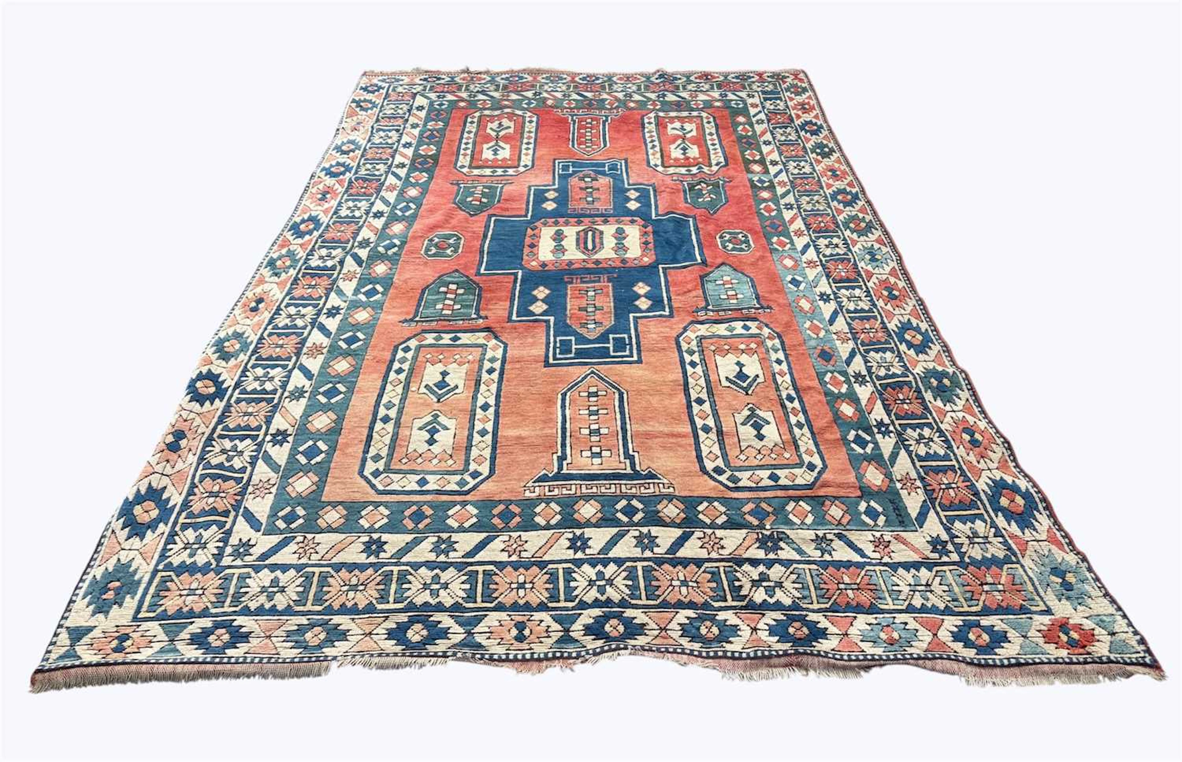 A Caucasian hand woven wool carpet