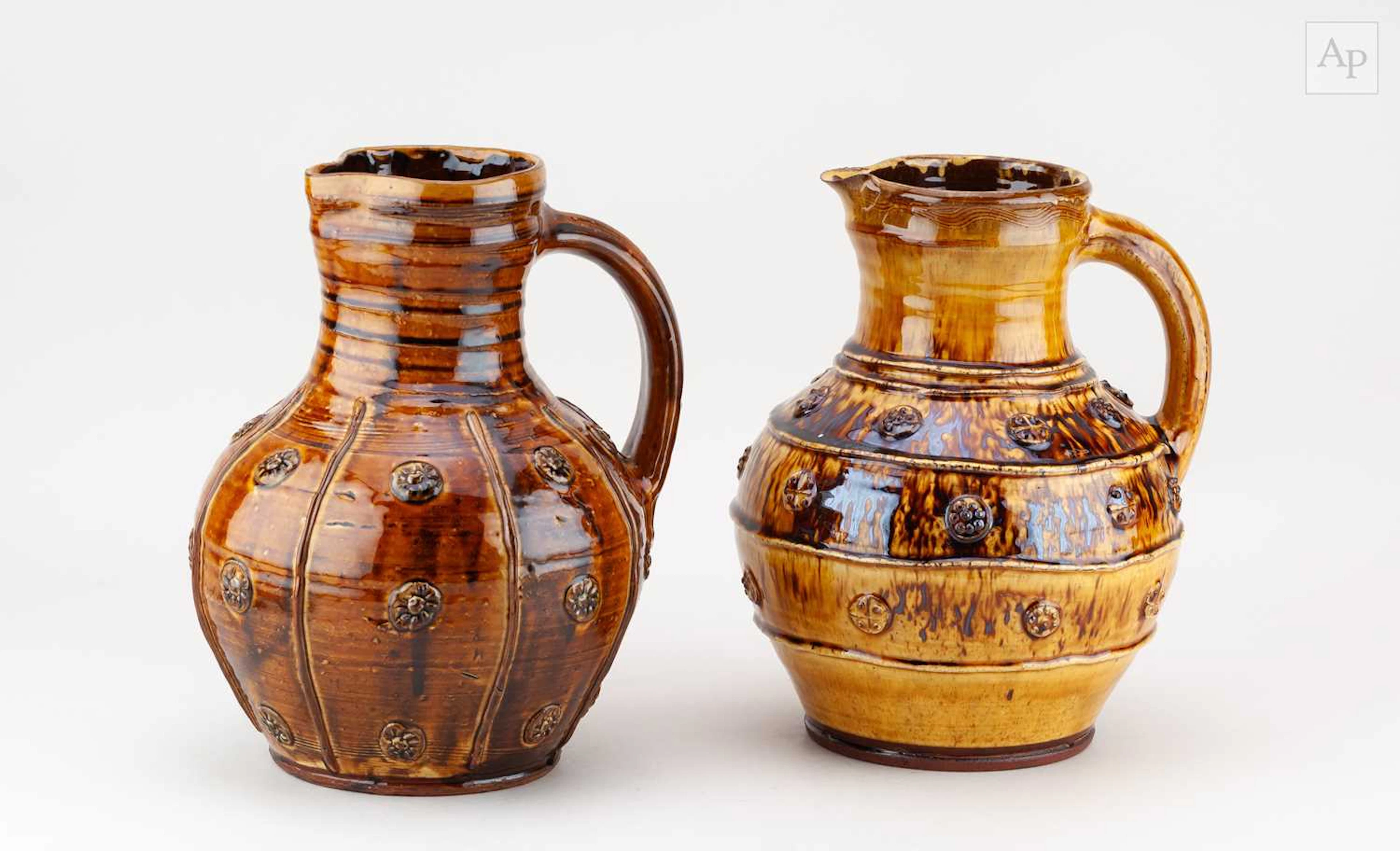 DOUG FITCH (born 1964); a near pair of slipware bellied...
