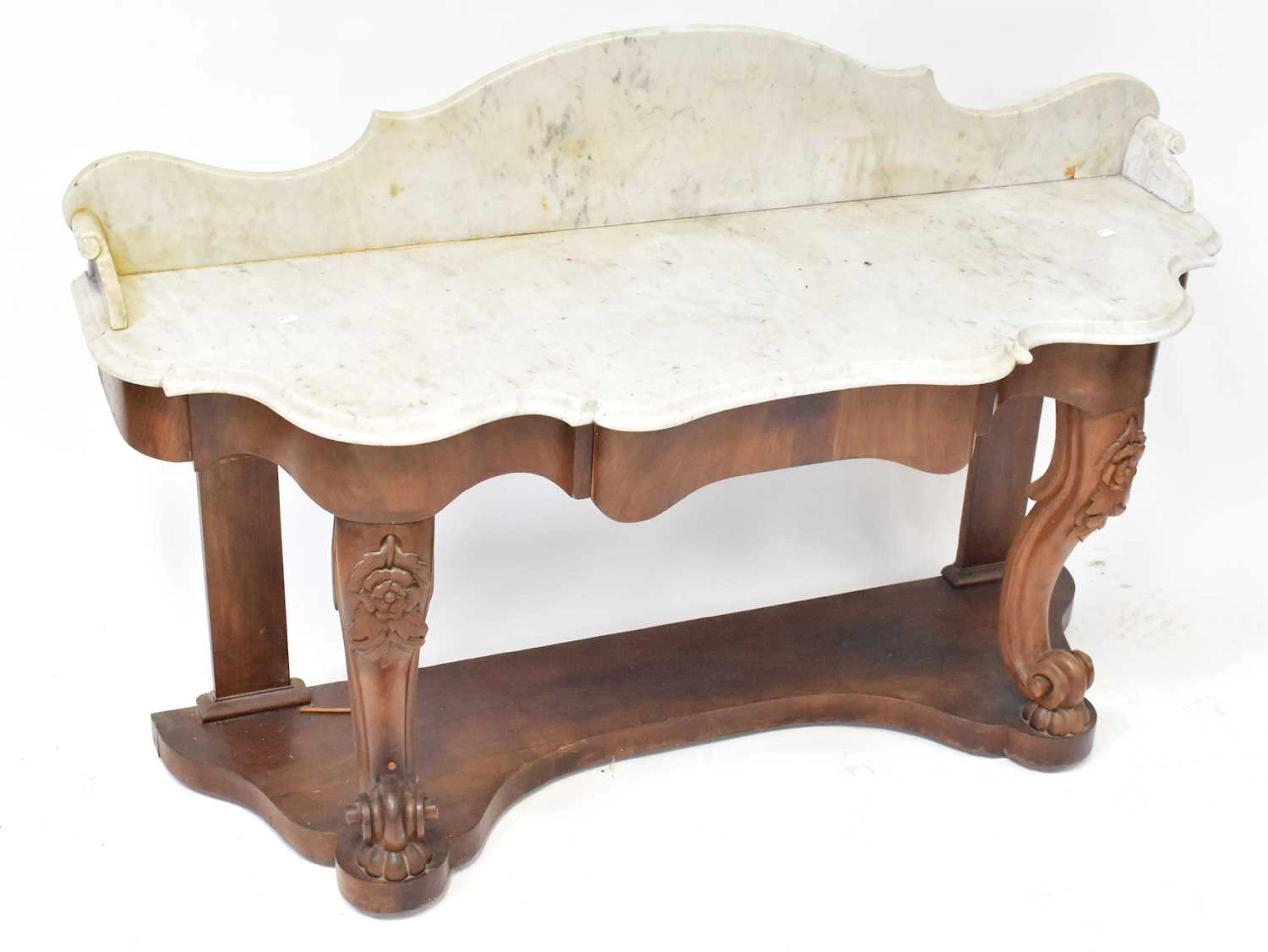 A 19th century style mahogany marble-topped serpentine-fronted washstand
