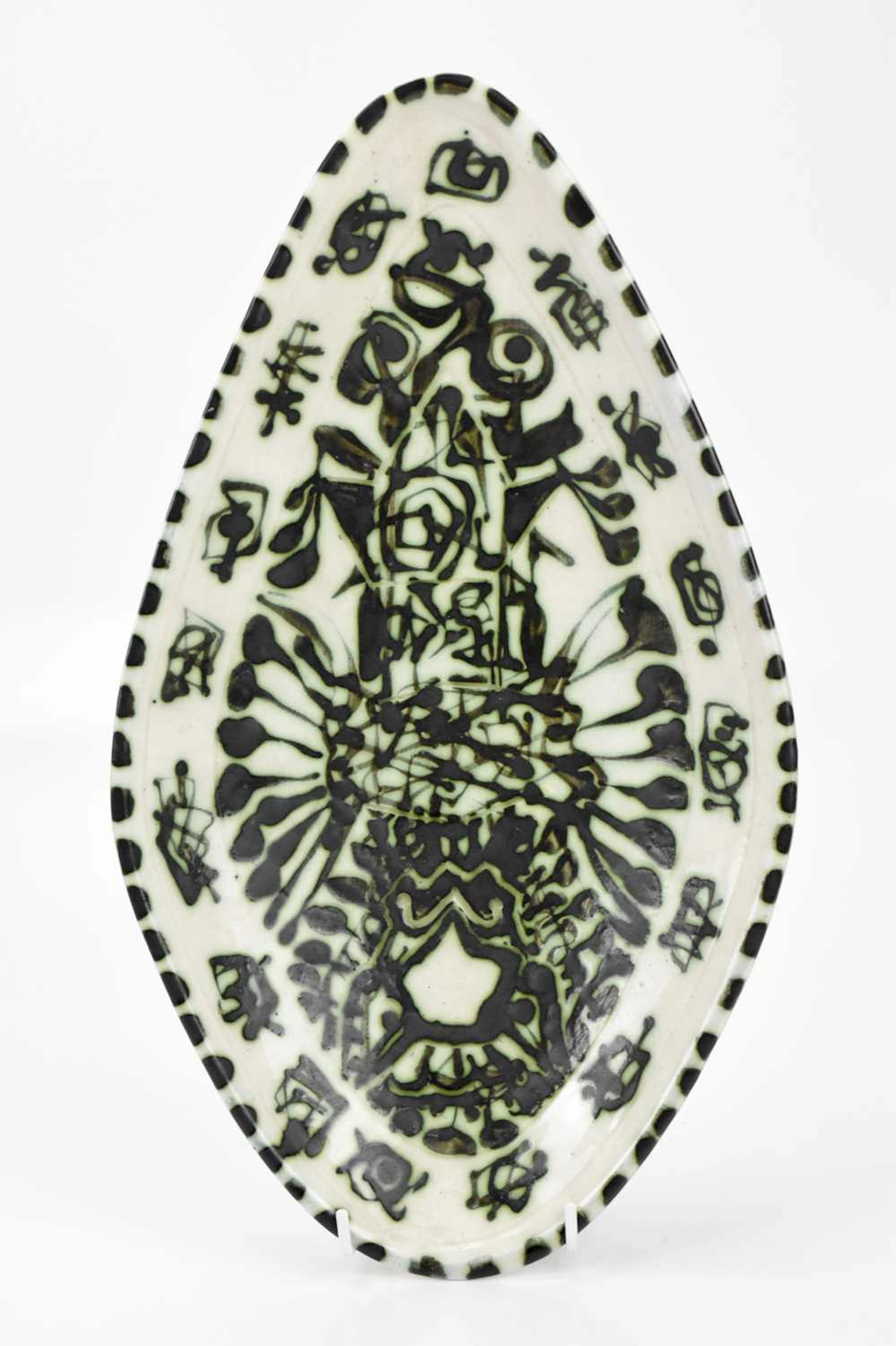 WILLIAM FISHER; an early Celtic Pottery shield shaped...