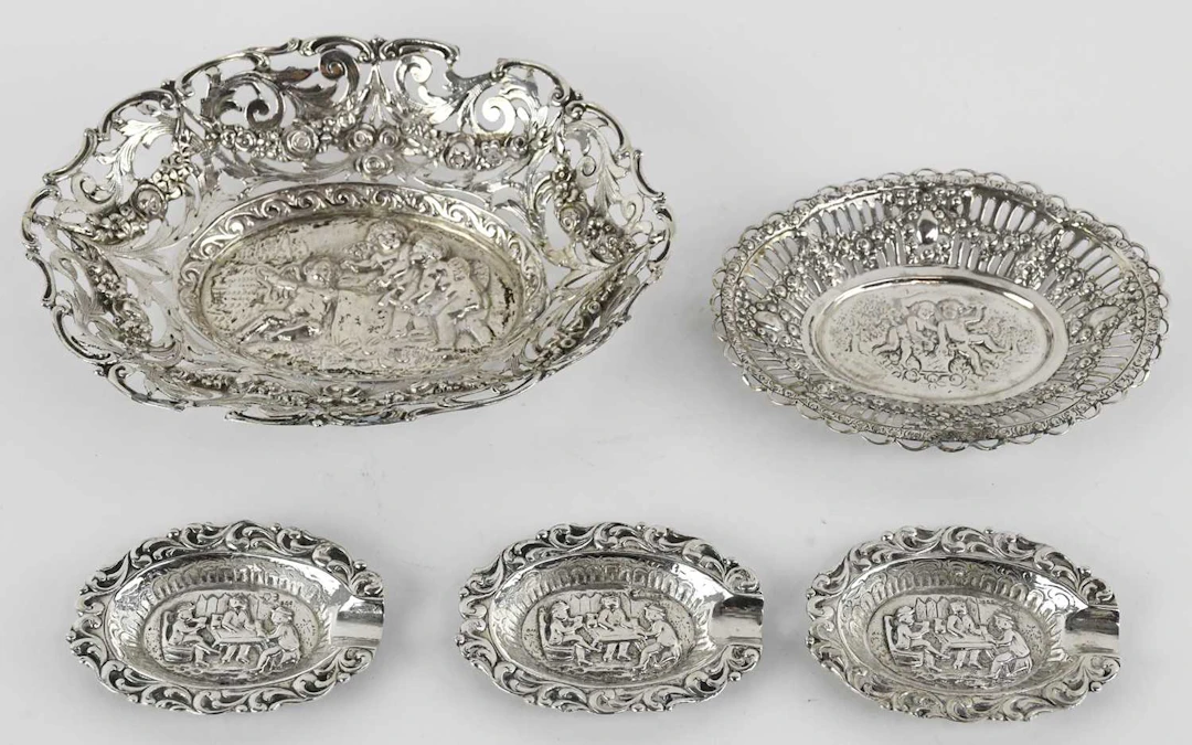 Two late 19th/early 20th century oval Continental white metal pierced dishes