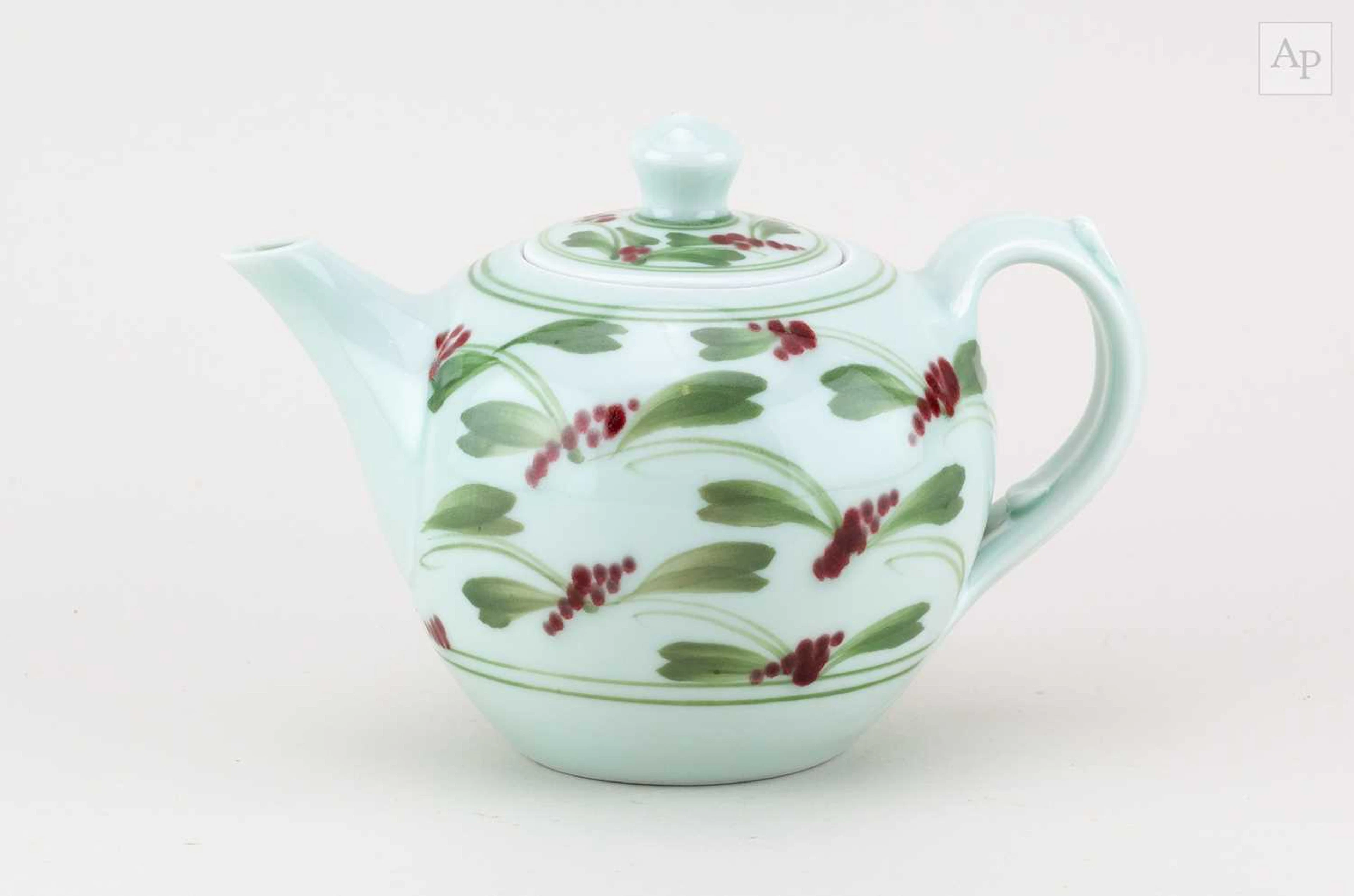 DEREK EMMS (1929-2004); a porcelain teapot covered in...