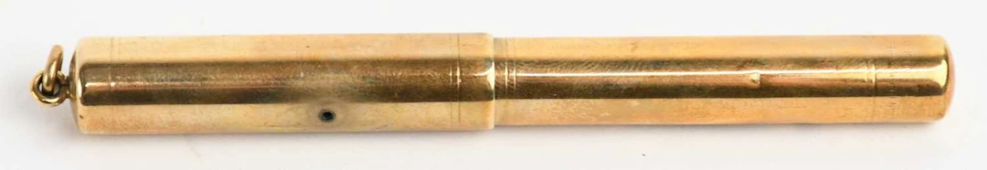 MABIE TODD; a 1920s/30s 9ct yellow gold self-filling fountain pen