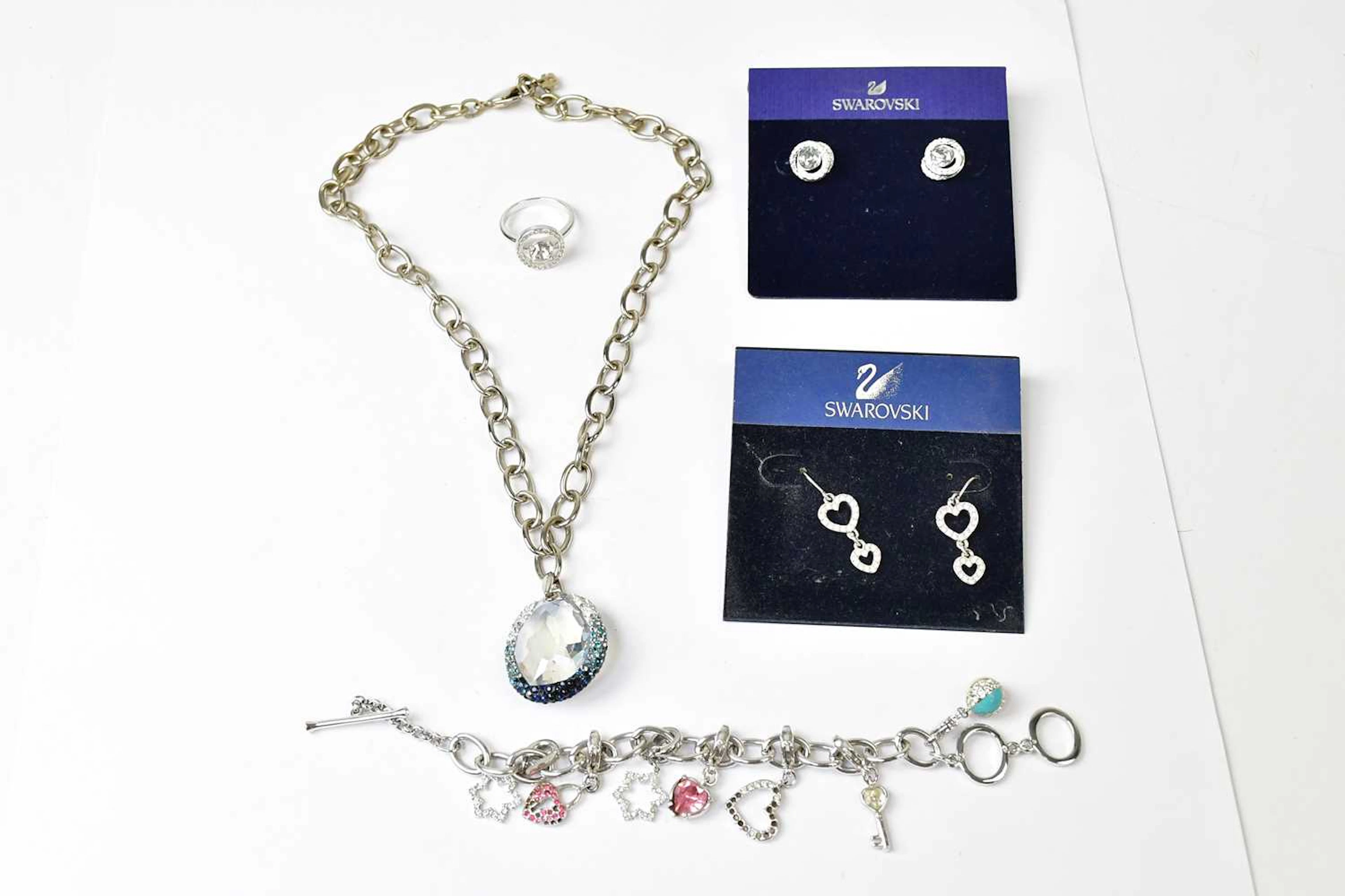 SWAROVSKI; five boxed items of jewellery