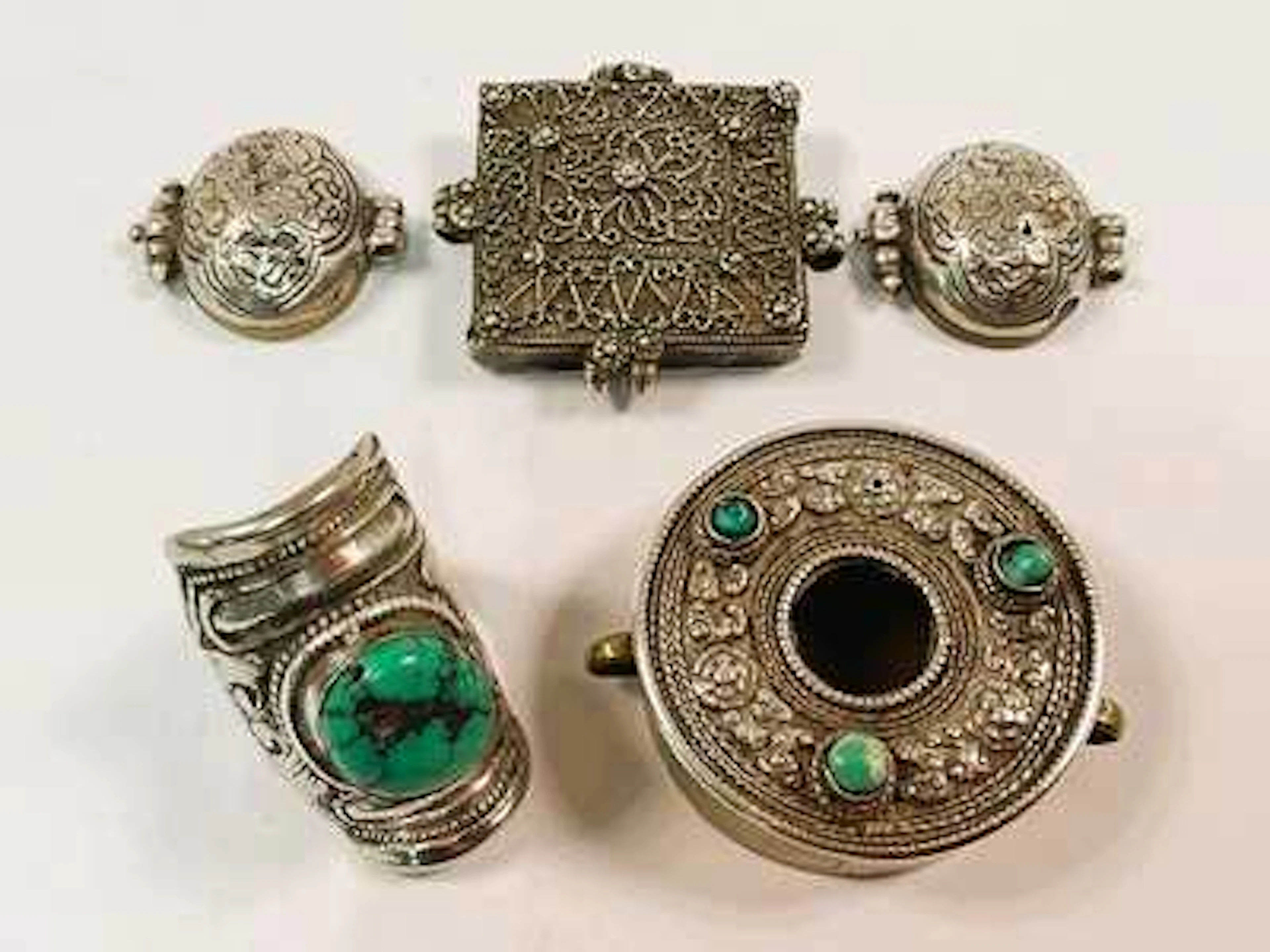 A Tibetan Ghau white metal amulet box