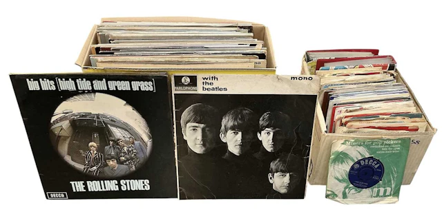 A collection of approximately forty-five 1950s and later records and LPs