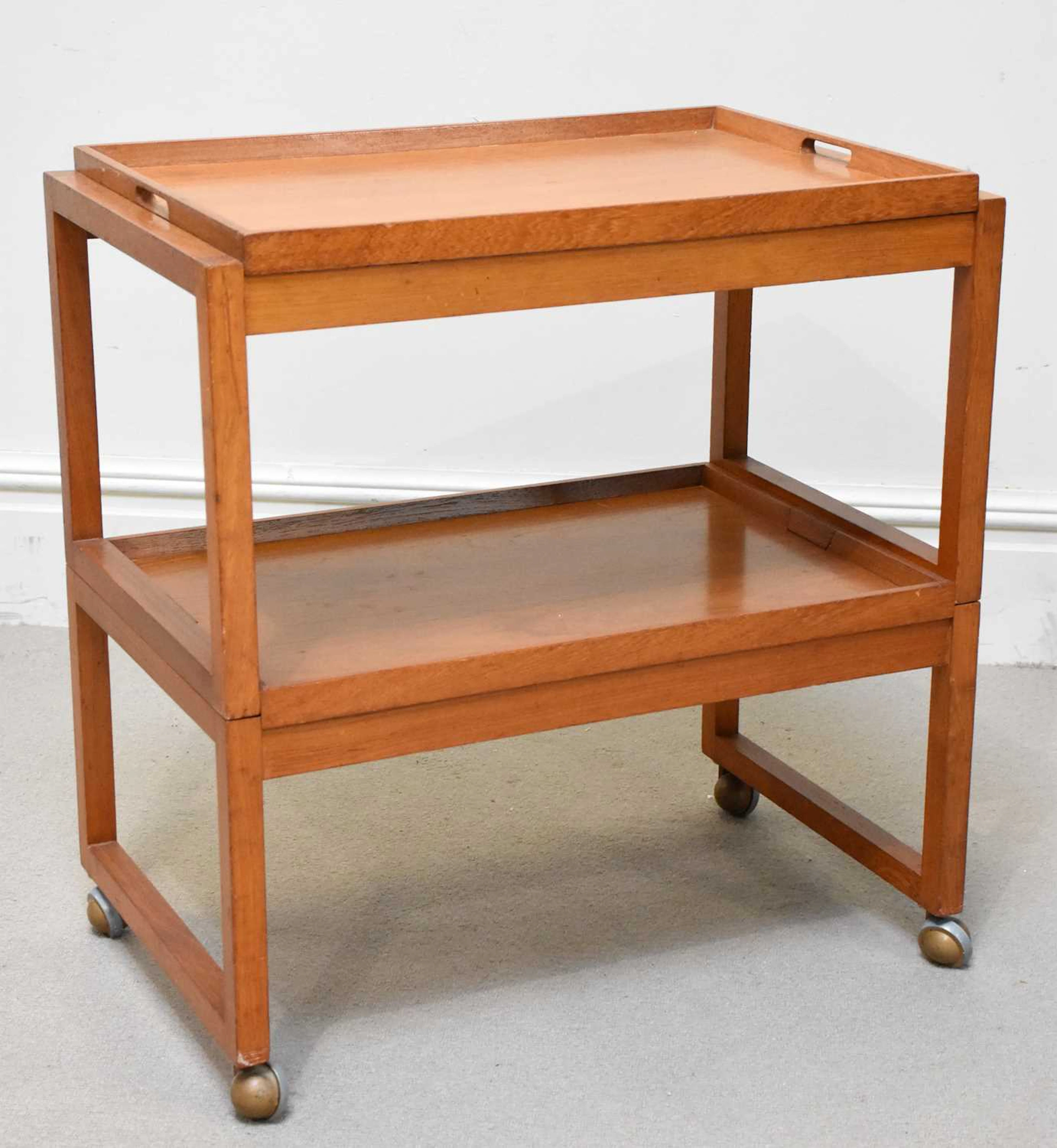 WHITE AND NEWTON; a teak three sectional drinks trolley