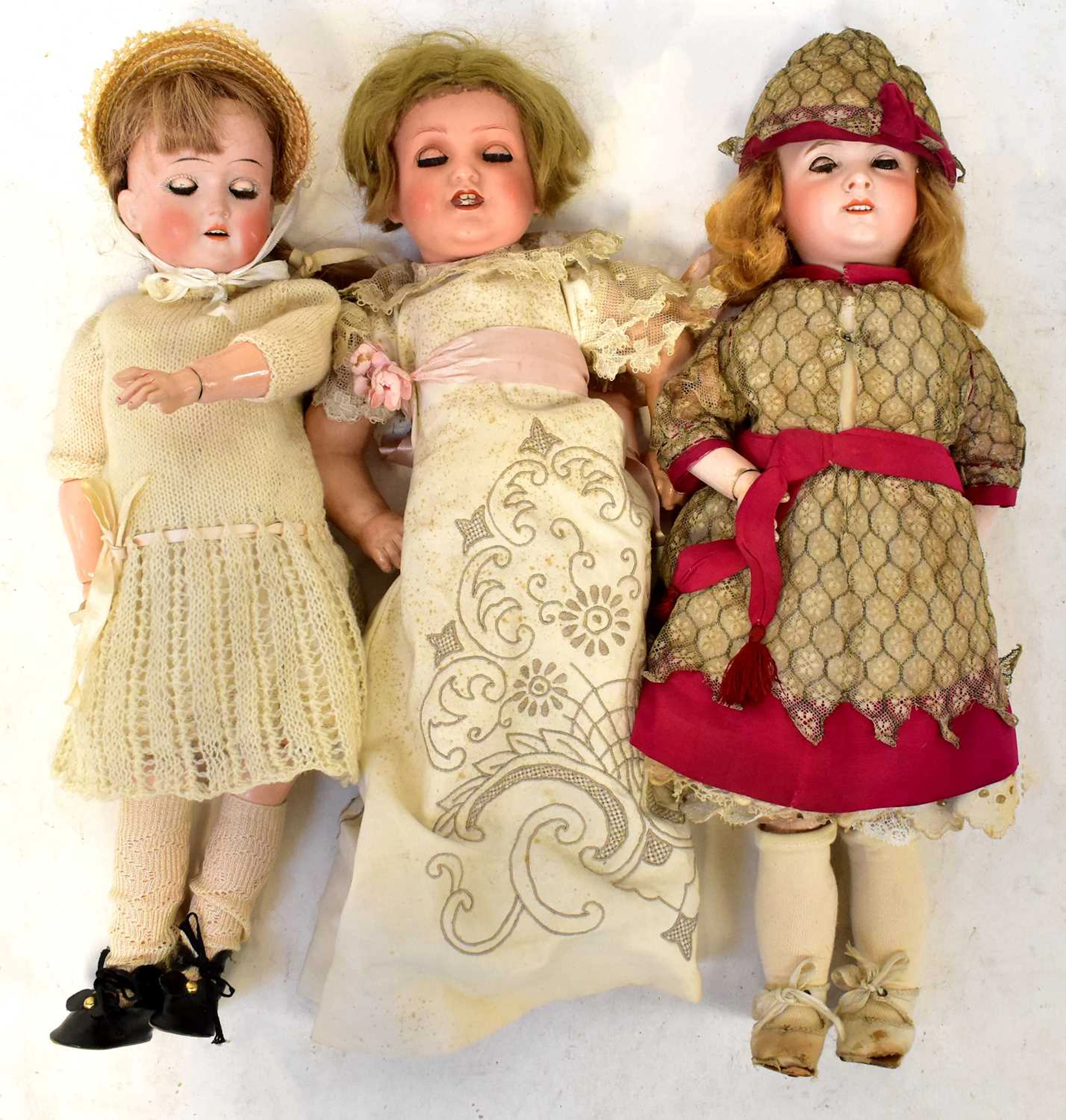 Three antique bisque headed dolls