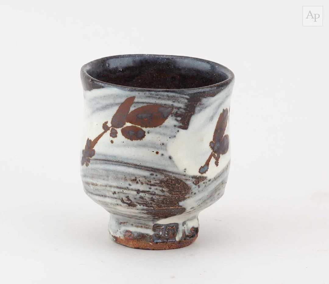 JIM MALONE (born 1946); a stoneware yunomi partially...