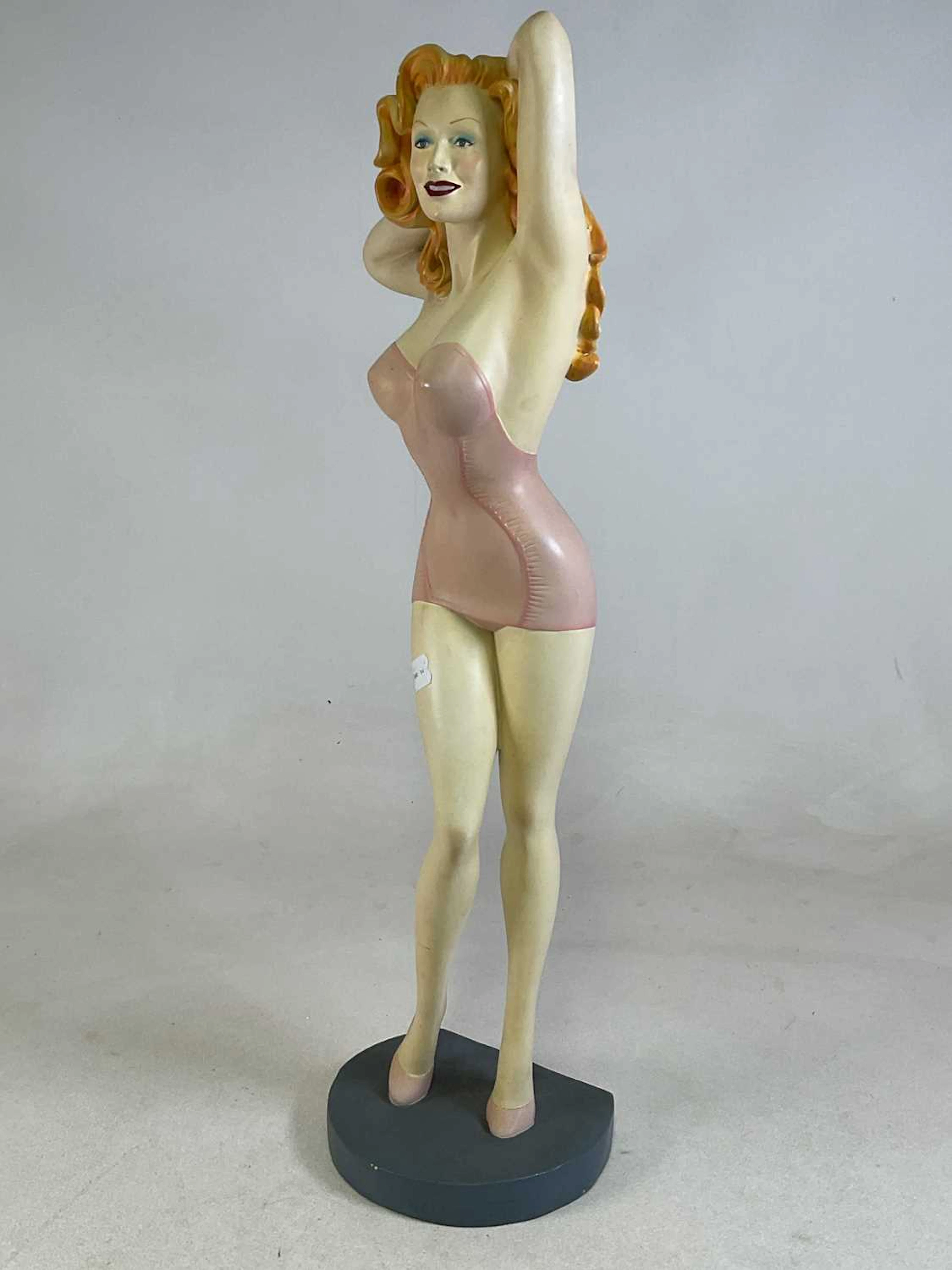 A large vintage fibreglass figure of Rita Hayworth