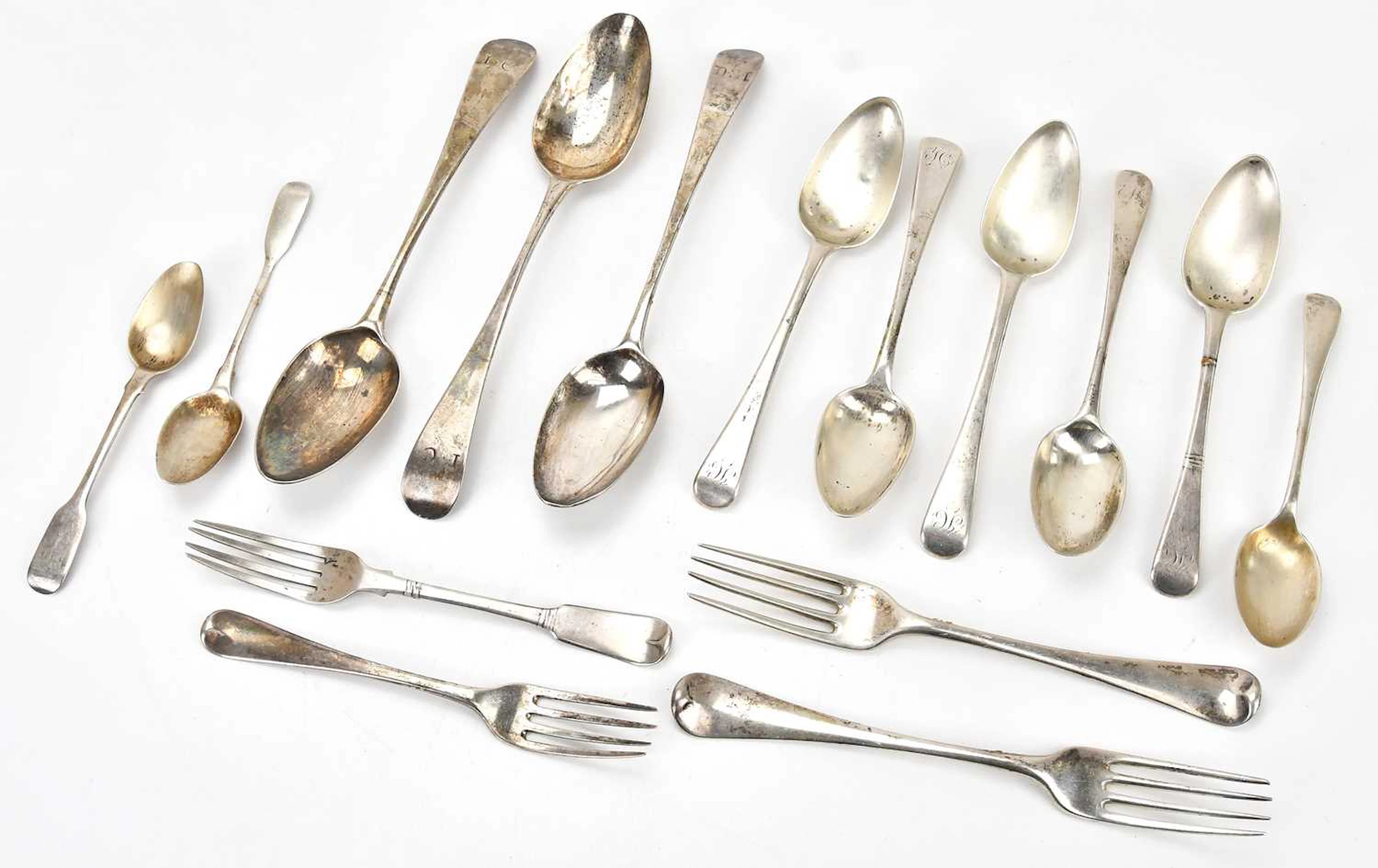 A selection of George III and later hallmarked silver spoons and forks
